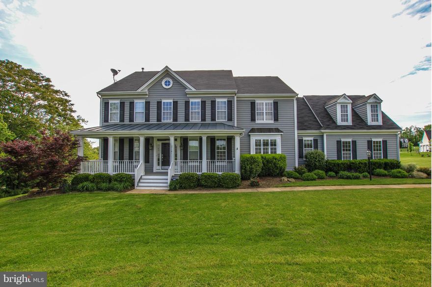 PRICED WELL BELOW APPRAISED VALUE! Home warranty Included! Quiet, private beautiful front porch, screened back porch with deck for entertaining. Beautiful hardwood floors on main and upper levels.Huge gourmet kitchen, cherry cabinets, granite counters & new SS appl. Master rm with built -in shelves in sitting rm. Rec room, Workshop, storage shed and a lot more.