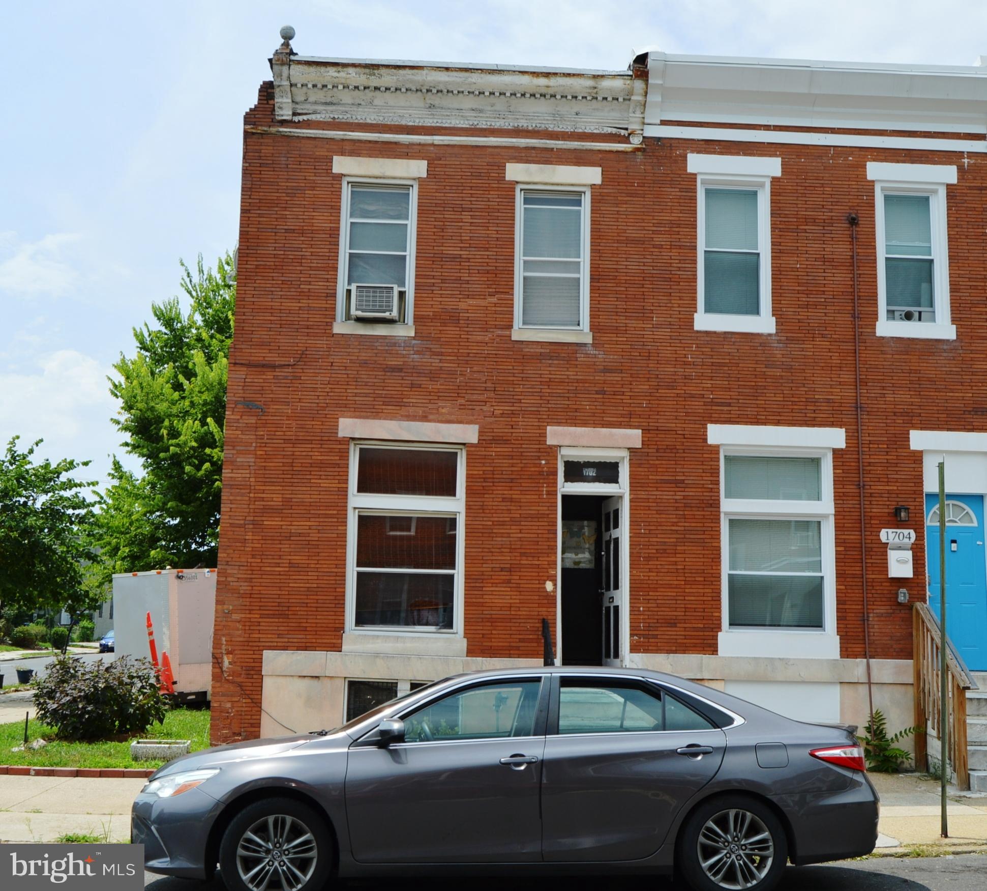 End of group unit. 3 full levels with fenced rear yard. The property has been well lived in and will need a full update.