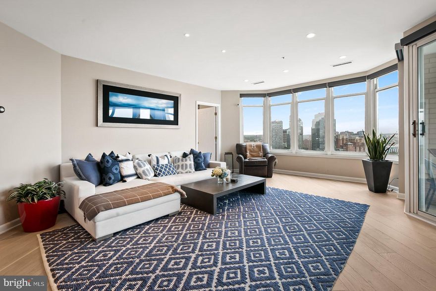 Welcome to your personal oasis in the Harborview community. This beautifully renovated condominium on the 17th floor offers breathtaking water views from every room. Experience the full panorama, stretching from Federal Hill Park in the west to the iconic Domino Sugar sign in the east. Upon entering, you'll immediately be captivated by the water vista and greeted by a convenient foyer with a coat closet for added storage. The spacious living room and dining area create a seamless flow, connecting effortlessly to the well-appointed kitchen with stainless steel appliances and lots of cabinet storage. Off the kitchen is an additional dining space with views. Your primary bedroom boasts two generously sized walk-in closets and a luxurious ensuite bathroom, complete with a walk-in shower, garden tub, and double vanity. The guest room also features an ensuite bathroom, large closet and grants access to one of two balconies, showcasing stunning harbor views. Additionally, there is a versatile third bedroom equipped with a high-end built-in Murphy bed, ideal for use as an extra bedroom, den, or office. For your convenience, a half bath is located in the hallway, perfect for entertaining guests. There's also a separate walk in laundry room with ample storage. The unit has been thoughtfully upgraded with top-of-the-line flooring, custom recessed and task lighting in the living room and kitchen, and custom electric light filtering blinds in the dining and living areas. In the bedrooms, you'll find custom blackout electric blinds, ensuring a restful night's sleep. Catch the incredible sunrise as you savor a cup of coffee on either of your two balconies, accessible from four different rooms. Situated in a prime location, this property offers a truly effortless lifestyle. Unit also has two conveniently located parking spaces and a separate storage unit. The Harboview building has great common spaces including a billiard room, large fitness facility and both indoor and outdoor pools. There is valet parking for guests and 24 hour concierge as well as private security for the neighborhood. Very close proximity to bars, restaurants, coffee shops and commuter routes.