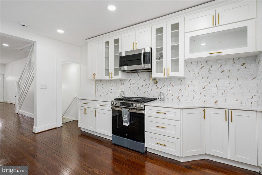 Beautifully renovated 4BR/3.5BA brick Townhome located in the quiet neighborhood of Clifton Park.  Make your way to the newly updated covered front porch and open the door into your forever home.  Step into a crisp clean main floor featuring a gleaming dark hardwood floor throughout the open concept floor plan.  The open floor plan allows you the ability to engage with family and friends from the spacious living room, cozy dining room or stunning kitchen.  The kitchen features mixed metals boasting gold accents against the stainless steel appliances, plenty of cabinets to the ceiling finished with crown moldings, sleek quartz countertops, a backsplash which complements the mixed metal, and a corner sink under a raised breakfast bar with seating and glamorous pendant lighting. Completing the main floor is a half bath, and tucked behind the kitchen a mud room.  The gleaming hardwood flooring continues through the second floor bedrooms. The newly remodeled and beautifully tiled shared bath is just steps from the two secondary bedrooms.  A large primary bedroom beams with tons of natural light and offers a newly remodeled full bath with a beautifully tiled walk-in shower with a spa shower feature.  The lower level is finished offering additional living space including the fourth bedroom, a full bath with walk-in shower, laundry, storage, a spacious family room, and a walk-out to the fenced yard.  From the mud room, step out onto a newly constructed stairway that leads to the patio with tons of possibilities.  This home is move-in ready, ideal for any new homeowner, and is located in close proximity to shopping, restaurants, and commuter routes.
*Seller prefers to use Front Porch Title*