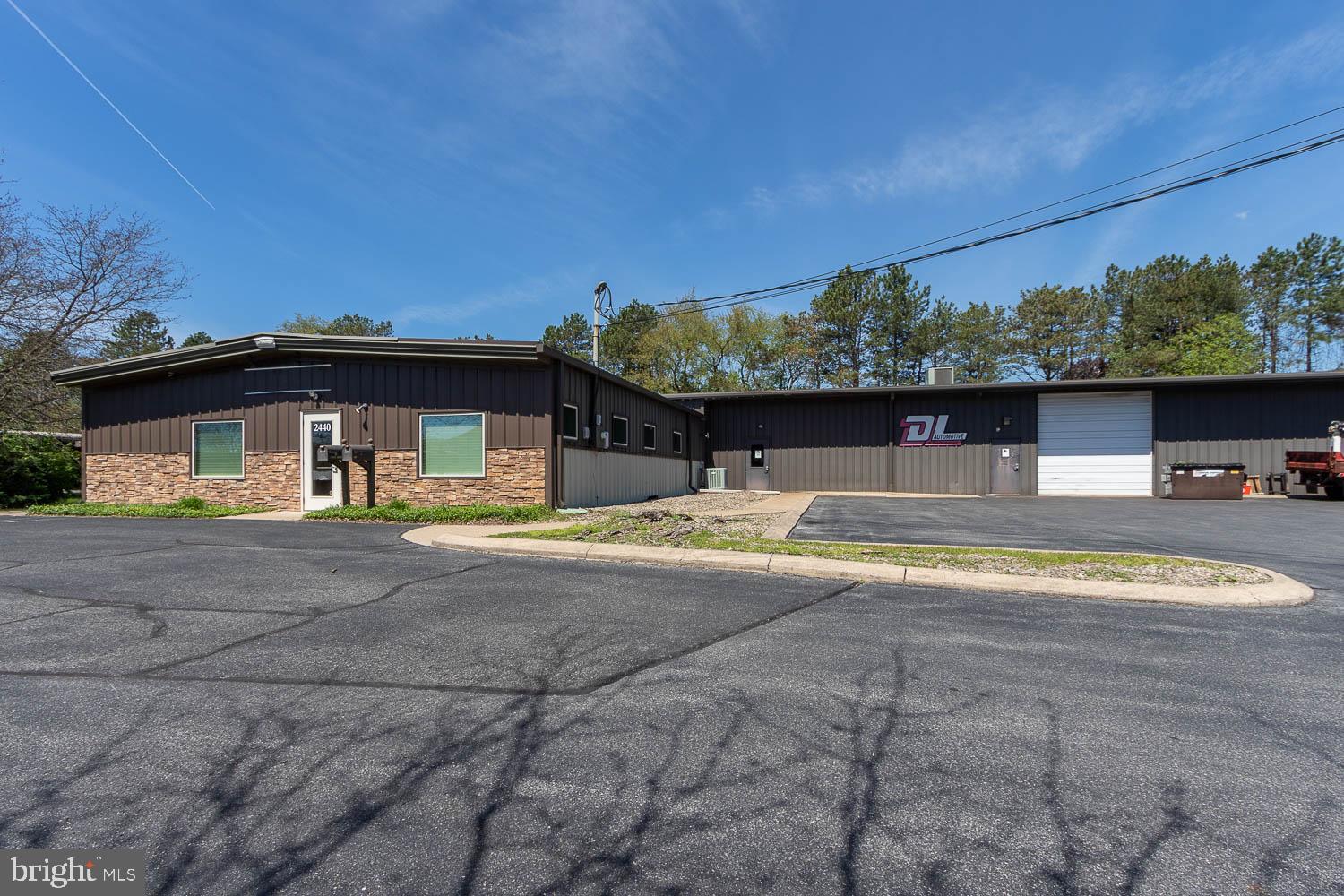 2440 COMMERCIAL BOULEVARD