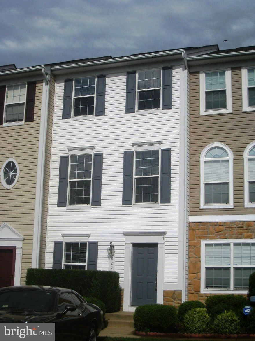 Three finished level townhome/condo in Lake Ridge area with lots of upgrades!  Kitchen w/ center island, ceramic tile floors & access to large deck.  Entry level features bedroom with adjacent full bath and recreation room and walk out to large patio and fenced yard.  Two large master bedrooms on upper level.  Great location -- close to everything!  Just pro cleaned.