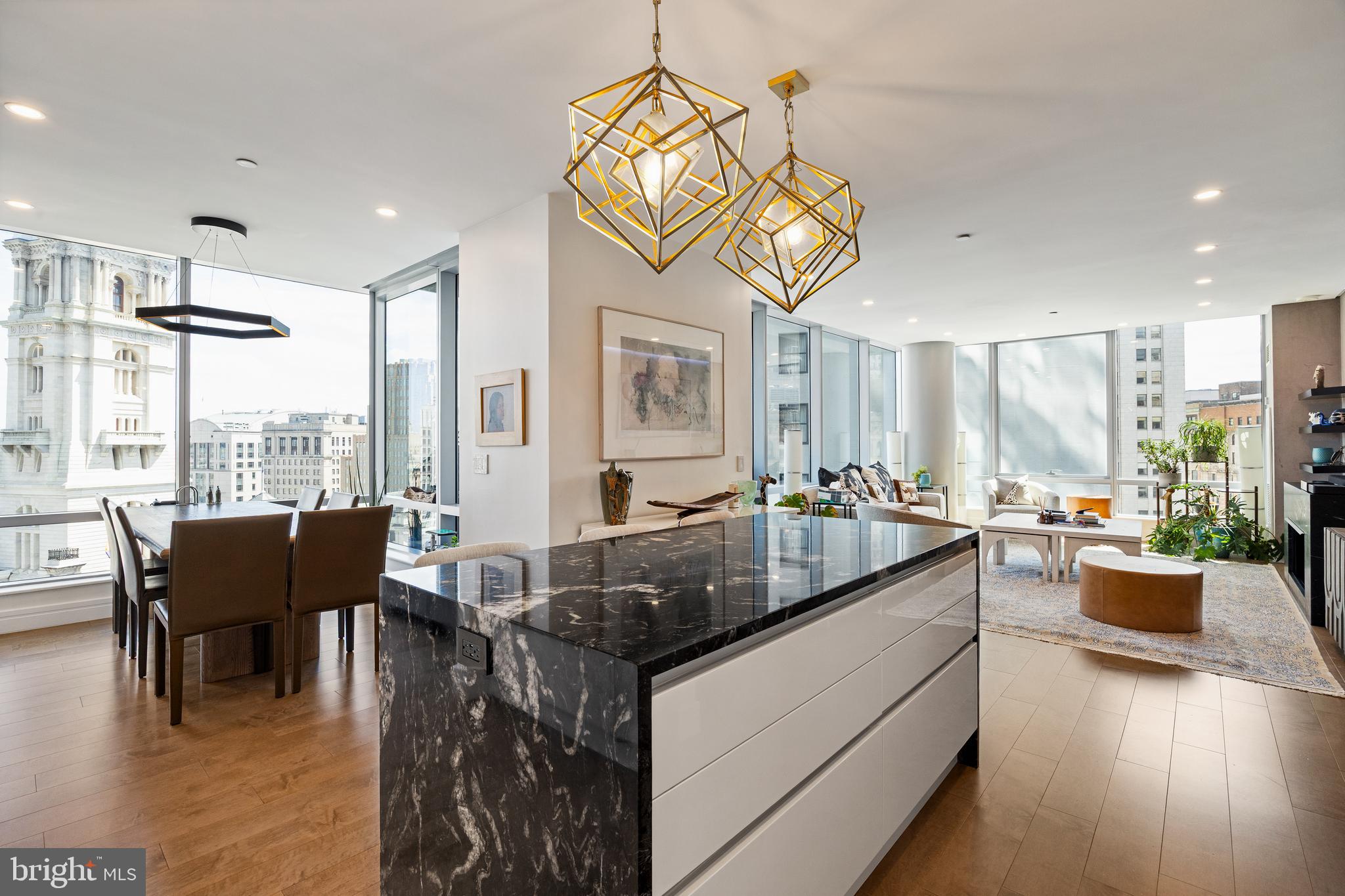 FULLY RENOVATED – Luxury Condo 3BR, 3.5 Bath, Balcony at The Ritz Carlton Residences This unit was gutted & fully renovated including Joanne Hudson kitchen, Ann Saks bathrooms, Mirage and Stark flooring – soup to nuts renovation! The unit features many high end design features and state of the art technology that include: Kitchen: Gaggenau Convection Oven, Gaggenau Oven/Microwave Combo, Gaggenau Five-Burner Brass Gas Cooktop with Wok burner, Fully Vented Hidden Gaggenau Range Hood, Kallista Faucets, Ann Sacks Marble Tile Glass Backsplash, Joanne Hudson Kitchen with Downsview white lacquer millwork and granite waterfall island and Kelly Wearstler Visual Comfort Lighting Fixtures Bathrooms and Powered Room: Kallista Faucets and Sinks, Ann Sacks Marble Tile, Kelly Wearstler Marble Mosaic Tile Flooring: Mirage Wood Floors Through Foyer, Kitchen, Living, Dining and 2nd/3rd Bedrooms and custom Herringbone Wood Through Foyer and Stark Carpeting in Master Bedroom Lighting: Recessed LED lighting throughout household and LED acccent lighting with RGB color options in kitchen, living, dining, and all bedrooms plus Kelly Wearstler Visual Comfort Lighting Fixtures in Kitchen, Bathrooms, and Primary Bedroom Closets and Storage: California Closets throughout all closets, California Closets built-in millwork in all bedrooms with granite tops in 2nd/3rd bedrooms Design: Kelly Wearstler and Christian Lacroix Wallpaper Throughout & Nero Marquina Marble mantle with European Home Gas Fireplace Technology: Complete Smart Home with Controllable Lutron Lighting, Audio/Video Systems, Fireplace, & HVAC Invisible Speaker Surround Sound System - Inside walls and ceiling ElectroLux Extra Large Washer & Dryer Fully concealed sprinkler system Fiber Optic Internet The Ritz-Carlton Residences with distinctive attention to details and design. This 3 Bedrooms, 3 1/2 Baths unit features a balcony with views of Dilworth Park and City Hall Clock Tower. The Ritz offers some of the best amenities in the city, such as: Chauffeur-driven town car, State of the Art Fitness Center with 54 ft. Lap Pool and Yoga Room, Gated Landscaped Garden with 12ft. Water Wall, 24 hr. Concierge and Front Doorman, newly renovated Residents Lounge & Media Room and dog run. 1 parking spot included in listing **2nd car parking spot available for additional fee**