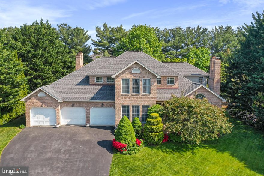 Motivated sellers, says bring  all offers! This gorgeous home in sought after Black Rock Estates awaits you. Situated on 0.509  acres this home boasts over 3,000sq ft and has 4 bedrooms(3 upper level/1 main level), 3 full bathrooms, new roof 2019, and a 3-car garage. Wood floors recently refinished and new carpet in main living area. Three of the four bedrooms have their own ensuite full bathrooms.  The primary bedroom is a massive 25x18ft with a wood burning fireplace and private balcony to enjoy the stunning backyard year-round. The primary bath has a sky light, dual vanity, marble flooring, jetted tub, and leads directly into the large sky lite walk-in closet. Main level includes wood floors in foyer leading to a sitting room/parlor with vaulted ceilings, gas fireplace w/marble surround, and opens to formal dining area. Gourmet eat-in kitchen with wood floors, granite counter tops, stainless steel appliances, center island with additional prep sink, wine rack, bookcase, ample counter space, and pantry. Open concept adjoining the kitchen to large family room which has another wood burning fireplace. Main level includes laundry room and another bedroom that could easily be made into a study or den if preferred.  The backyard and patio are a gardener's dream come true with lush trees and blooming flower gardens. Basement includes rough in plumbing for additional bathroom, a wood burning stove, and ample space for another bedroom. Close to Black Rock Golf Course, Hagerstown Community College, Meritus Health Medical Campus, Washington County parks, Interstate 70, and just minutes away from shopping, and dining. 
Come make this beauty your new abode.  HOME WARRENTY INCLUDED!! SELLER CREDIT to qualified buyer for updating and flooring.   Make your showing TODAY!