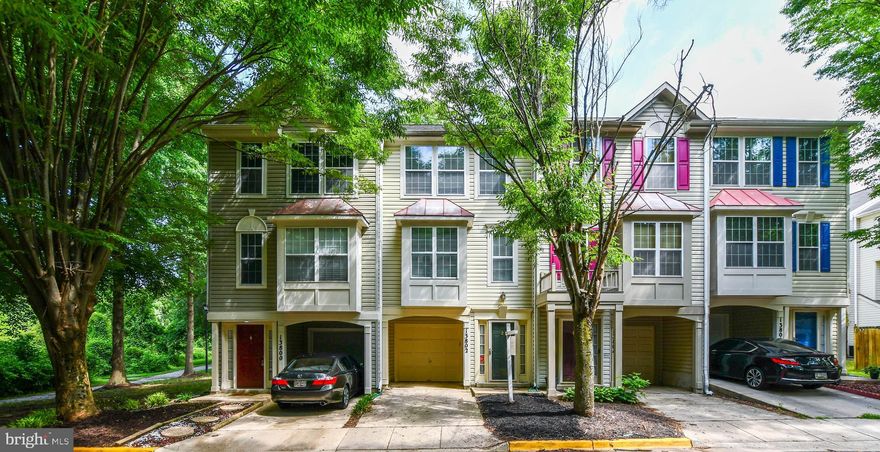 JUST REDUCED!! PRICED TO SELL.   SEEKING THE PERFECT BUYER FOR THE PERFECT HOUSE.  Welcome to the Villages of Marlboro.   This gorgeous townhome is absolutely stunning.  Its beauty boasts 3 amazing levels of living.  When you enter the first level, you will find the foyer with access to the one-car private garage, and the lower level laundry room, also access to the backyard oasis.  The main level is adorned with oak hardwood floors throughout, there is a combination living room and dining room, the kitchen is updated with stainless steel appliances, backsplash, granite countertops, and oak cabinetry.  The kitchen floor has ceramic tile.  Step up to the half bath and the stairs to the upper level where you will find two Master SUITES.  This is a very unique feature in this home, as both bedrooms have their own suite bathroom.  They also have hardwood floors in both.  The home has been freshly cleaned and painted and it's ready for your pickiest buyer.  This home is priced to sell and will not last long at all. It is conveniently located near the beltway which makes driving to DC, and surrounding counties easily accessible.  It is truly a must see!! It's the PERFECT price, PERFECT location, PERFECT 10!!!