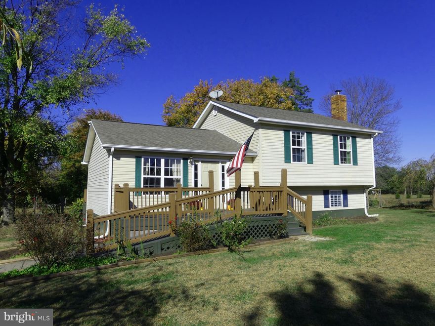 Charming Barboursville home set on 4+ acres and just 10 minutes to Ruckersville / Orange / Gordonsville and 25 minutes from the north end of Cville. Three / Four Bedroom home with two and a half baths. Fiber Lync has just been run down the road and according to the neighbor -installation in the home is $35 with a service agreement. Yes, fiber internet in Barboursville. Primary BR has its own walkout, raised deck. Additional decks off the dining room and in front. Family room has a wood stove with brick base/wall and is flanked by bookcases. Just the right buffer of trees around the property with ample room for gardens, chickens, etc. Seasonal views of the Southwest Mtns to the east and one to the north. Owners did not plan to move but are relocating to TX so they did a few updates during their stay: heat pump outside unit and inside coil; kitchen stove; half bath; extra vinyl plank flooring; encapsulated the crawl on the left side; preventive perimeter termite treatment; septic pumped July 2020; repainted front and back lower deck. Septic design is 3 bedrooms (6 persons) and the lower level room can be a bedroom/office. Ready for new memories and welcome to the country!