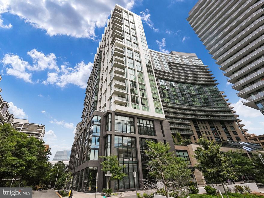 Welcome to 1781 N Pierce Street, an exclusive penthouse oasis perched high above Arlington, Virginia, offering the epitome of modern elegance, sophistication, and convenience.

Step into a world of refined luxury as you ascend to the 26th floor via the exclusive direct-access elevator, whisking you away from the building's grand lobby to your exquisite 3 bedroom, 2½ bath residence. The luxurious living area beckons you with its soaring 10-foot ceilings, gallery lighting, and automatic blinds that artfully control the flood of natural light pouring in through dramatic floor-to-ceiling windows. The sleek gourmet kitchen is a chef's dream, boasting quartz countertops, an oversized island with seating, and top-of-the-line appliances. The seamless transition between the kitchen and living areas allows for effortless entertaining.

Retreat to the primary suite, a sanctuary of tranquility and refinement, featuring automatic blinds to ensure uninterrupted rest and relaxation. The walk-in closet offers ample space for your wardrobe and accessories. At the same time, the primary bathroom is a spa-like haven with quartz countertops, double sinks, and an array of thoughtful touches like mood lighting, heated floors, and a private toilet area. Two additional bedrooms complete the unit, each bathed in natural light and with breathtaking city views.

On the upper level find a private office that steps outside to a stunningly spacious wrap-around terrace, ideal for both intimate and large gatherings, and with views that are sure to impress. The luxury extends beyond the residence with access to a host of top-tier amenities. You're just steps away from the private club room and rooftop terrace, featuring a resort-style pool and high-end BBQ amenities. Enjoy a state-of-the-art fitness center, secure garage parking with EV charging stations, and 24/7 concierge service catering to your every need.

This urban sanctuary in the heart of Rosslyn––and just moments from Georgetown––offers an unrivaled opportunity to embrace a lifestyle of sophistication and convenience, with close proximity to trendy restaurants, upscale shops, and cultural attractions. Seize this chance to call this remarkable residence your own.