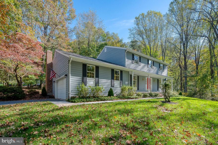 Rare opportunity to be the homeowner of this lovely center hall colonial in the sought-after community of Merrymans Mill!  This incredibly spacious home sits on 1.2 acres at the end of a quiet street privately surrounded by lush greenery & trees. Enter into the elegant foyer leading to a huge living room & separate dining room, perfect for dinner parties.  Follow through to the large country kitchen w/center island & awesome family room w/wood burning stove, skylights, & access to the cozy patio & beautiful back yard;  convenient powder room, as well as laundry room w/garage access.  Hardwood flooring & ceramic tile on main level.  The carpeted upper level boasts a large primary suite w/updated bath & walk-in closet; three additional spacious bedrooms & updated family bath; & attic w/plenty of storage.  The lower level consists of a family room,  bonus room for office/craft room/play room, etc., & large utility room.  The outside is a private oasis w/tree lined views in front as well as back.  Country living yet conveniently located near all the amenities of Jacksonville, Hunt Valley, Cockeysville, Timonium & Towson .  One year home warranty for peace of mind.  Don't miss this one!