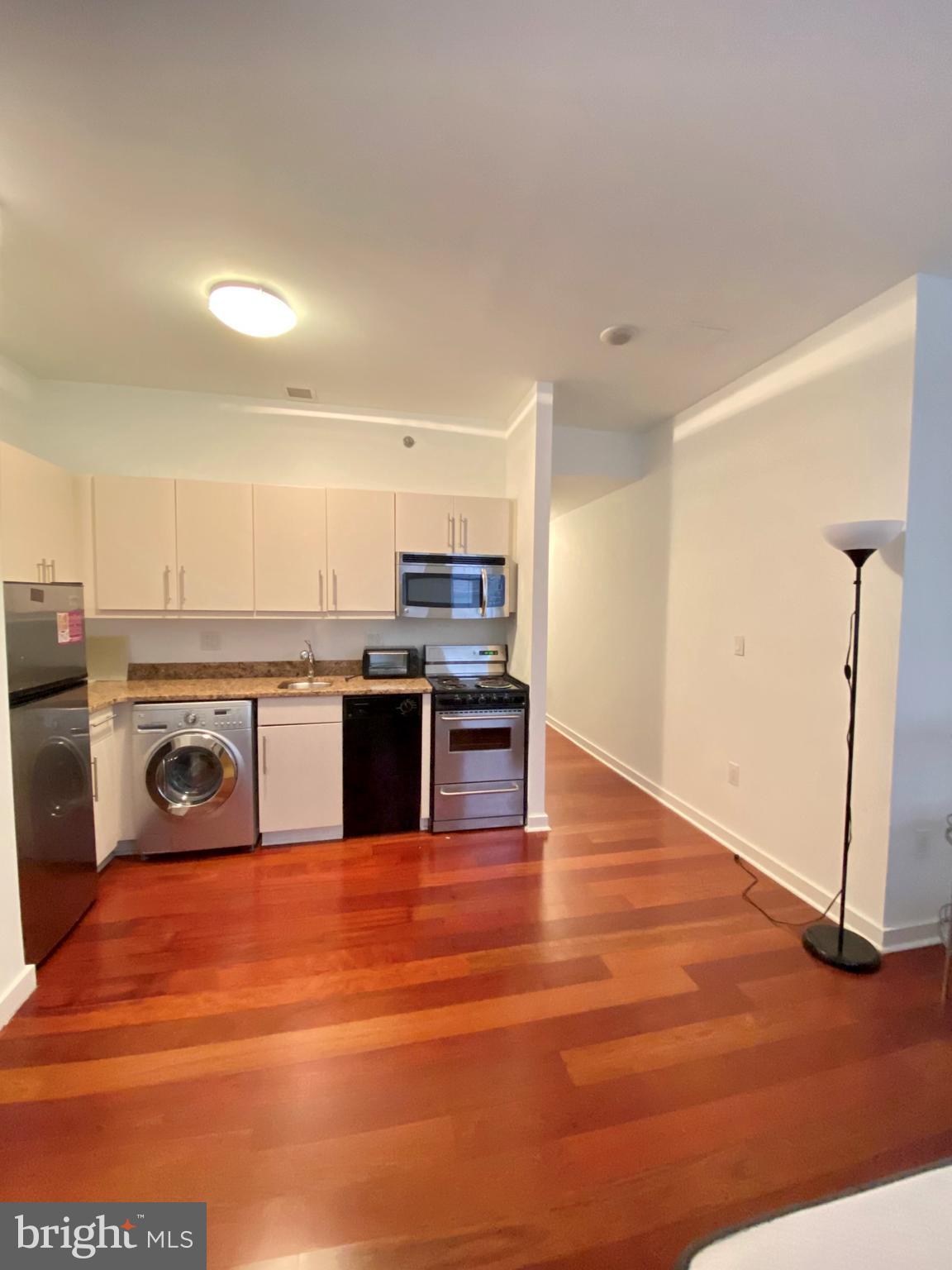 Beautifully appointed studio available at Parc Rittenhouse on Rittenhouse Square. This home has an open living space with rich hardwood floors and two large windows. The kitchen has stainless steel appliances, granite countertops, and white cabinets. The full, hall bathroom is appointed in marble and has an oversized vanity and tub shower. Residents of Parc Rittenhouse enjoy world class amenities and services including a 24 hour doorman; an amenities suite that includes a new state-of-the-art fitness center and resident lounge with pantry; media room; outdoor rooftop pool club with a large pool deck, full size pool, kids pool and hot tub; garage parking below the building for an additional fee; and two amazing restaurants on the ground floor, Stephen Starr’s Parc and Via Locusta.