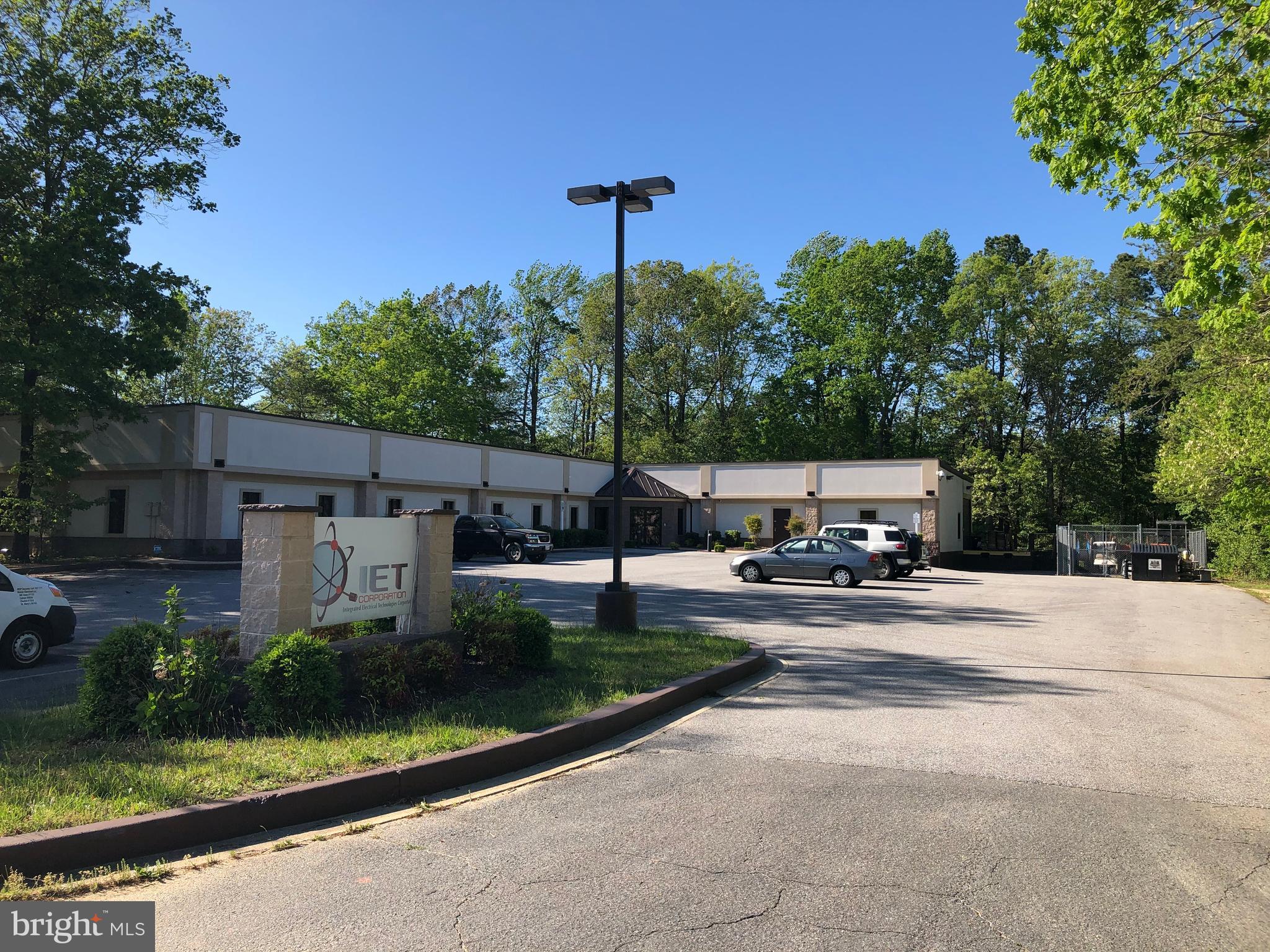 Prime Office and Warehouse Combined Building being offered for Lease in the St. Mary's County Industrial Park. This building has 12+ Private offices, conference rooms, training rooms, restrooms, a full kitchen and more. There is 2,400+/- SF conditioned warehouse with additional mezzanine space, a loading dock at truck height and an electric 11'x10' garage door. There is also an 800 SF fenced lot included in the rent.