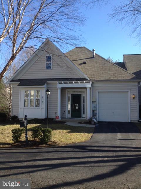 Well maintained Villa style home in 55+ gated community. This home boasts 2BR / 2.5BA. Open floor plan beautifully designed for one level living. One bedroom on main level and 2nd bedroom & bath on upper level, GREAT FOR GUESTS. Fireplace, one car garage and community offers a clubhouse, pool and walking trails. Located near major highways and shopping.
