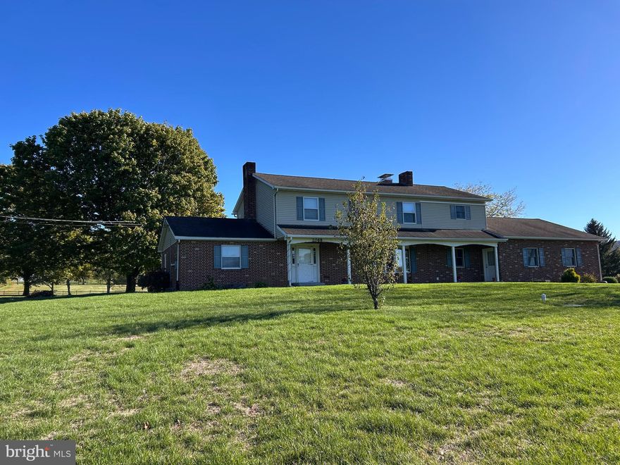 One of a kind treasure! Beautiful views and charming! You will love the welcome home feel of this Penns Valley beauty. Nestled on a 4.3 acre lot, this spacious two story home has been lovingly maintained. Step inside and be greeted by the country charm of open fireplaces, tile and wood floors, galley style kitchen with lovely wood cabinetry. Huge family room area for gathering with family and friends. Formal dining area with slider to extensive hardscape patio off the kitchen.  Upstairs you'll discover an expansive primary suite with two walk-in closets and a large private bathroom. Three additional bedrooms and a full bath provide plenty of room for your family or guests. Oil furnace is currently used for heating the water only but could easily be reconnected to be used as a back up heat source as well. Need garage space?? This home has 2 garages with room for 4 vehicles, the attached garage even has a heated floor! Another 24x24 shed with garage style doors has been used by the seller in the past for parking spare vehicles. Fenced back pasture area perfect for a horse! You will love this special home, inside and out!  Conveniently located close to State College/Campus, wineries, shopping and schools,  bringing the perfect fusion of country living with the easy access to town! Schedule your tour today!