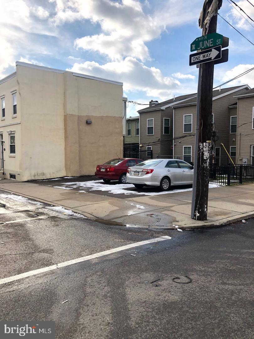 15.33 Ft X 40 Ft True Corner Lot. Currently paved and used as off-street parking. Taxes are $18 per year. The zoning is CMX2. BRAND NEW PERMIETER FENCE On the same block as the Philadelphia Housing Authorities development, newer construction homes. There are also a number of new construction projects underway and in planning stages in the immediate area. Give me a call today to make a deal. Buyer is responsible for obtaining a clear U&O.