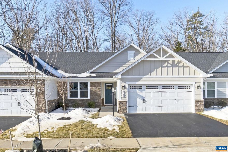 New construction without the wait!  Beautiful Caicos plan in Rivanna Village Villas. Enjoy one-level living on one of the best lots in the development, backing to lovely wooded space and scenic paths.  Very low maintenance with JamesHardie� plank siding and stone accents; yard maintenance handled by the HOA!  Spacious open floor plan with upgraded LVP flooring in the great room.  Gorgeous kitchen outfitted with Timberlake Downing Duraform cabinets in Harbor, quartz countertops, center island, tile backsplash, pantry, and stainless appliances.  The Primary bedroom is tucked away in the rear of the home for quiet privacy and features a large walk-in closet and en suite bath with double vanities and tile shower with seat.  The second bedroom faces the front of the house and is served by the full hall bath.  Office/den could easily serve as a guest room.  Oversized 2-car garage offers plenty of additional storage.  Covered, rear concrete patio provides a perfect respite for morning coffee or evening cocktails.,Maple Cabinets,Painted Cabinets,Quartz Counter