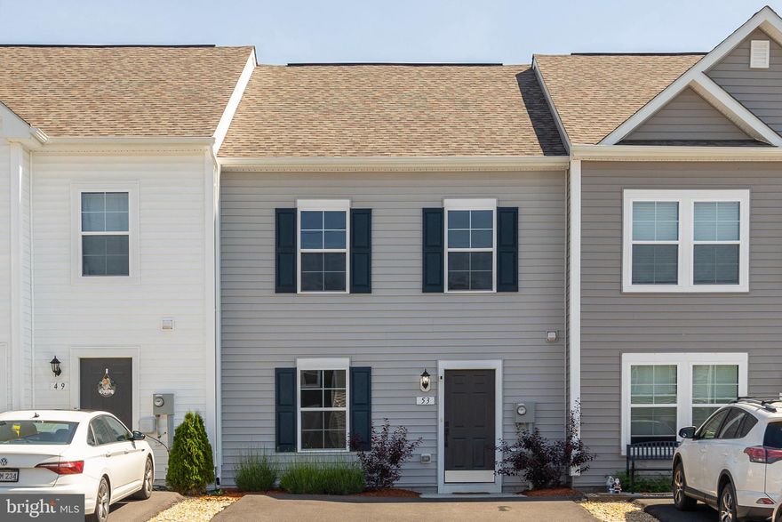 No need to wait for a new build, Like New townhome available now.  Home features nearly 1500 fin sq ft that has three bedrooms and 2.5 baths.   Open floor plan on the main featuring Luxury Vinyl Plank flooring  , Granite counter tops in the kitchen with all Stainless Steel appliances and Pendant lighting over the Island.   The floor plan has a kitchen /dining combo with plenty of table space.  Home has the upgraded bump out on both floors giving you the extra finished space that others do not have.   Master bedroom has its own private full bath as well as huge walk in closet.  The other bedrooms are ample size and are just down the hall from a full bath and the laundry room is on the bedroom level!   Exit the kitchen to the back yard you will find a nice patio to relax and enjoy nature as the property backs to a wooded area.   Great location just minutes from Martinsburg/Charles town/Marc Train.   A MUST SEE TODAY!