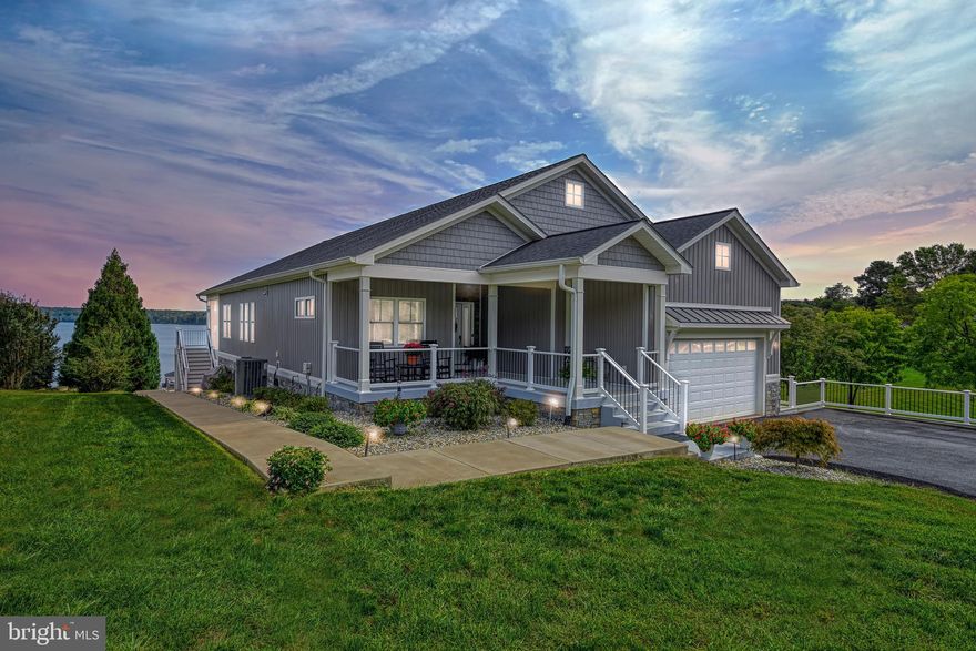 NEW PRICE AND MOVE IN READY!!!! Welcome to Oak Grove Estates, located on the public side of Lake Anna. This stunning waterfront lake house and views are second to none!  Approximately 87 ft of the most beautiful waterfront includes 2 jet ski lifts, covered boat dock w/lift and Sunsetter awning, floating dock with cover and ceiling, a beautifully designed patio with fire-pit, and a sandy beach area.  Highlights of the house include 5-6 BRs (one used as an office), a gourmet kitchen equipped with stainless steel appliances, beautiful cabinets, upgraded quartz countertops, kitchen Island with seating and gorgeous luxury vinyl flooring throughout covering every room, no carpet! Open Living/Dining area with gas fireplace, huge windows with electric blinds and the doors open to a full-length screened porch area overlooking the fabulous views of Lake Anna. On the main level you will also find the Primary Bedroom with glass doors opening up to the rear deck, a large walk-in closet with a shelving/organization system and drawers, the Primary bathroom has a tiled floor, spacious shower with glass door and 2 shower heads. Two additional bedrooms and full bath are on the main level making the perfect private space for children and guests. The rear of the home overlooks the stunning views of the lake from your large composite deck. The fully finished walk-out basement offers an additional full kitchen, Family Room, 2 Bedrooms, full bath, and unfinished space for expansion. Walk-out doors open to rear yard and absolutely breathtaking lake views!   Oversized 2-car garage with shelving units.  This home comes complete with a whole house generator, 2 sheds, a patio at the lake with a firepit, hot tub, dock steps.  With an acceptable offer, Sellers will convey a Bennington Pontoon Boat with 250HP, 2 jet skis, a zero-turn mower and most furniture.