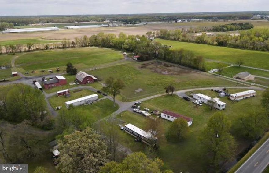 **Location, Location, Location** All the possibilities are available with this  farm! There are  15+ 
 acres -which includes 3 subdivided lots with rentals  with total of 6 rentals ., a 35x50 barn with 8 horse stalls and 4 pastures, 2 ponds, a 35x40 work shop with two large doors currently being used as an 18 wheeler truck business, back  6 acres currently being used to grow and bale hay .  The property also comes with a 1.4 floating commercial property. (see documents for possible uses) zoned BN . Seller is licensed real estate agent.