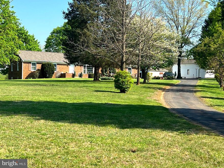 Potential Horse Property, No HOA. Single Level Living. All Brick home built by a perfectionist, quality, Master Builder. Main Floor has 4 Bedrooms, 2.5 Bathrooms. Enjoy cool evenings in the Living Room with a  beautiful Stone Wall including a Wood-Burning Fireplace with Solid Walnut Mantel and raised Hearth plus expensive artistic custom ceilings in Living Room, Hallway and 2 of the 4 Bedrooms. Main Level also has Kitchen open to Dining/Family Room boasting a nice Mural and French Doors leading to the Patio where one can take in BREATHTAKING VIEWS and relax while enjoying Mornings, Days and Sunsets. Main Level Laundry Room with Custom Coat/Pantry Closet and Half Bath. 1-Car Attached Garage (more Garage spaces in Workshop building). Full, Unfinished Climate-Controlled Walk-Out Basement with Wood stove. Huge 2 Level Workshop/Garage with Electricity plus Chimney/wood stove hook-up, Shed with Electricity, Another Shed/Run-In Shed(s) (bring your horses), Replacement Windows (Spring, 2022), New, Taller/Adult size Toilets (2022). New Architectural Shingles on all Structures (3 Years Old). Area is surrounded by horse farms and only 5 miles from Warrenton. On many, really clear evenings there are billions of Stars to be seen. A place to call Home. State Road in front of property has been re-paved now. Buried Heating Oil Storage Tank is Owned and originally coated with Tar to prevent deterioration. Agent related to Owner.