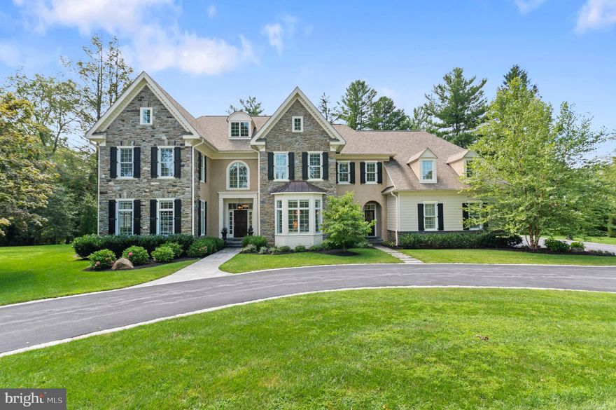 Welcome to 117 Masons Way! This six year old, better than new, construction with in the exclusive enclave of Worthing in Newtown Square, is located just 2 miles from the center of Wayne, 2 miles from Ardrossan and 3.5 miles from the Devon Whole Foods or the new Whole Foods in Newtown Square. Situated on the Radnor/Newtown Square border, this location is ideal if you are a person who values convenience. Take a hike on the nearby trails that are part of the preserve, or go sledding at the Willows, it's all right in your backyard! This 5 bedroom, 7  bath model, called the Wyndham,  the second  largest floor plan in the Worthing community of 18 custom estate homes on 32 acres. This community features arguably some of the most beautiful open space, and ultimate conveniences, that the Main Line has to offer.  The acre and a half property sits between two quiet cul de sacs. You will be welcomed by the the expanded circular driveway, taking you right to the front door and family foyer, or to the 4 car garage.  Inside, 10 foot ceilings and  3 perfectly planned rooms on the left side of the front to back foyer. Formal living room with wood burning fireplace, billiards room for ultimate fun in entertaining, and a light filled sunroom with space for a quiet retreat, or a music room, as pictured here with the baby grand piano. Directly in front of you is a grand staircase with a custom built in window seat, and to the right of the front to back foyer is the extra large dining room. What's better for entertaining than a dining room that can hold a crowd?! As you enter the heart of the home, the primary gathering place, the chef's kitchen, you will be wowed by the white inset custom cabinets that go all the way to the top of the 10 foot ceilings. The wet bar with a sub zero beverage center connects the dining room to the kitchen area, and provides guests a convenient and easy spot to mingle or find refreshment. The oversized island provides plenty of seating and a place to congregate. Appliances are all upgraded, including Subzero refrigerator and freezer, Wolf 6 burner gas range with griddle, Dacor double ovens and a Miele super quiet dishwasher. The morning room/breakfast room looks out to the terrace and just beyond that is the great room with a gas fireplace and a wall of custom built in cabinetry and millwork. Also off of the kitchen is the formal powder room and the walk-in pantry. Just beyond the kitchen is the family foyer, or mudroom. This is a great place for entry from the garage or driveway for people to drop bags or kick off their shoes after a long day. Grand back staircase and informal powder room along with a walk in coat closet complete this area. Outside on the custom terrace, there is a gas line to the Firepit and grill tucked up against the house in the large private backyard.  Upstairs, hardwood floors lead you into a magnificent main bedroom suite, complete with a sitting room, walk-in closet with center island and extra large luxurious bathroom suite with heated floors, double marble vanities, free standing tub, separate Water Closet, seamless shower door, rainfall shower head  and linen closet. Also upstairs is a large laundry room, and an open homework suite at the top of the back stairs which acts as an upstairs family room or gathering area. 4 additional oversized bedrooms and 3 additional full baths complete this warm and inviting, yet sophisticated second floor.  The finished lower level with extra tall ceilings has large daylight windows, and a TV and game area that is large enough to host friends and family to watch the game or to hang in for a movie. Plenty of room in the lower level for a pool table and a ping pong table. Powder room in the lower level and plenty of unfinished space for storage complete this level. Whole House Generator. Award winning public schools as well as quick access to The Episcopal Academy and various Country Clubs on the main line make this location super convenient!