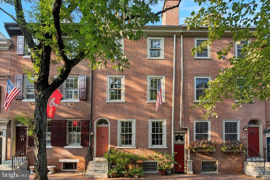 This wonderful home is in the heart of the Society Hill neighborhood of Philadelphia and is available for the first time in almost 60 years! Two tax parcels are included, 515 Delancey St & 518-520 Cypress St.  The 60’+ deep garden brings to mind the scenic beauty and timeless elegance of the Tuscan countryside and has fenced-in parking for 1+ cars. The property expands a full city block onto quiet streets, full of history and a strong sense of community. You’ll notice right away that this historic home’s brick façade has been repointed. The roof was replaced in 2019, and it has five working wood burning fireplaces and newer windows. 

Entering from Delancey St, you're welcomed into a spacious living room with a fireplace, which leads to the kitchen, dining room, and a full bath. The Dining room 2016 addition, including a full bath, is open to the kitchen with a center island, stainless steel appliances, and a Vulcan range/salamander. It is flooded with light from skylights, tall windows, and French doors to the spectacular garden for entertaining and relaxing. The garden has a beautiful arbor with grape vines creating a natural canopy for a large table for friends and family to gather for meals and parties, mature plantings, and flower beds. There is fenced in parking into the garden from the additional lot on Cypress St. 

The second floor has a large bath with laundry and a large bedroom each with a fireplace. There are two additional bedrooms with fireplaces on the third floor. The front bedroom boasts hand crafted wall to wall cherry wood bookshelves. The top floor (attic) has a spacious workspace with natural sunlight. The basement houses utilities, a full bath, built-in bed and built-in sofa. 

Walking score 97, Bike score 84, and Transit score 100. Supermarket and Pharmacy are conveniently located on 5th St. Washington Square Park, Pennsylvania Hospital, and Independence Mall are close by.  Located in the McCall Catchment. Convenient to Rte. 676 and I95.