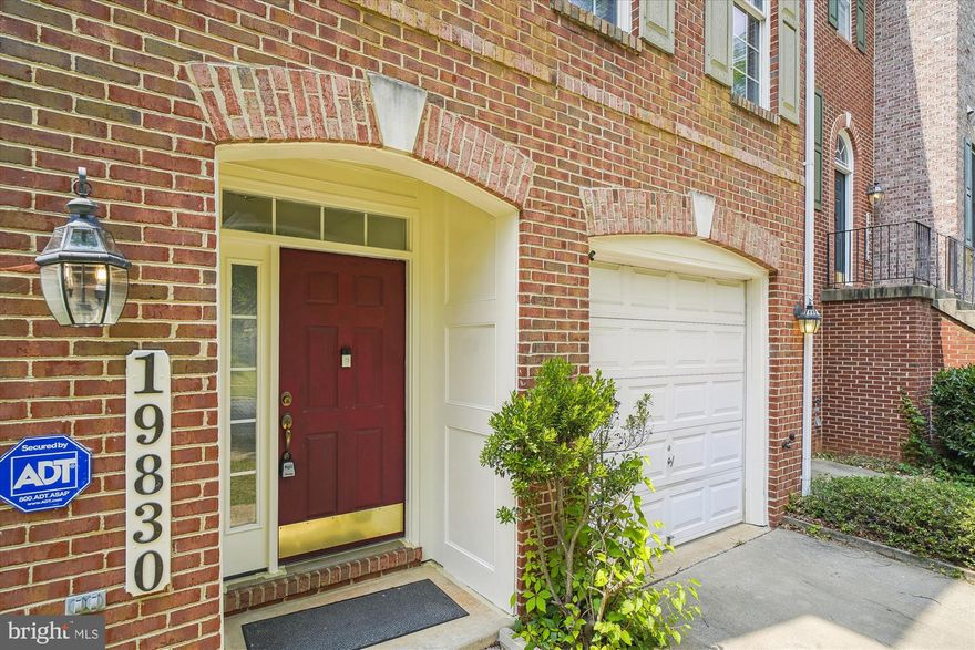 Welcome to this sunlit 4 bedroom 3 and 1/2 bath brick end unit townhome. Upon entering the tiled entrance foyer of the main level, you are immediately drawn to the inviting and spacious family room/bedroom with adjacent full bath. The laundry room with connecting door to garage and 2 hall closets complete the first floor.  Ascend the newly carpeted stairs to the well-designed layout of the second floor with hardwood floors, and high ceilings. The open floor plan provides the living room, dining room, half bath, and eat-in kitchen with island (double sinks), cozy fireplace, additional table space, pantry, and floor to ceiling bay windows. Perfect for entertaining!  Continue up the stairs to the third floor, to find the 3 bedrooms, also newly carpeted - primary suite with walk-in closet and en-suite bathroom, 2 additional bedrooms, full hall bath, and linen closet.  All freshly painted and move-in ready! Convenient to MCPS Schools, U.S. Dept. of Energy, Montgomery College, and 270. Shopping, supermarket, restaurants, library, and recreation are all within just a few block walk of this lovely home!