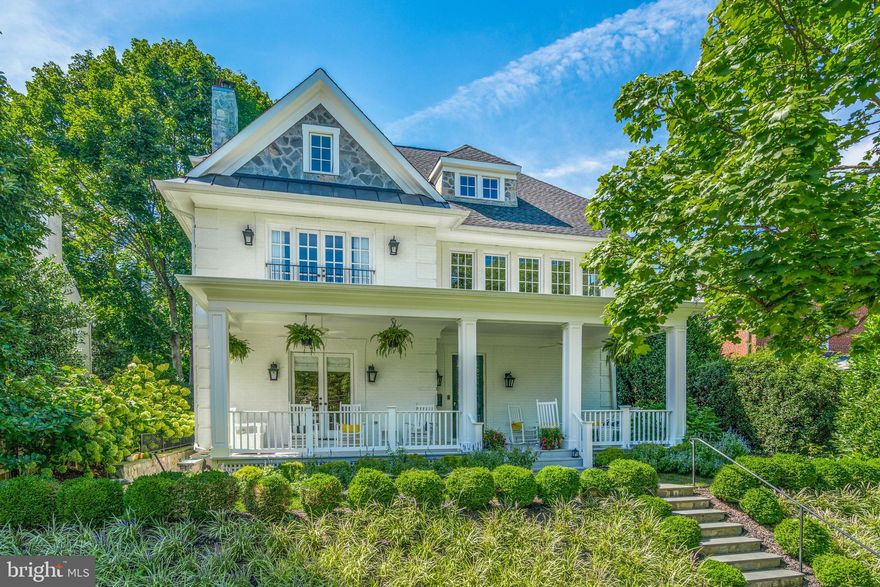 Built in 2015 in the heart of Spring Valley, curb appeal abounds with a newly-added, oversized 10-foot front porch with a custom-made eight-foot swing and Charleston Co. rocking chairs, ideal for everyday living and entertaining.  Sun pouring in from the east brings light into the whole front of the home, including the French doors, and large window-filled atrium staircase that floods the second floor and third floors with light.  The entire house is upgraded with designer touches, including Farrow & Ball paint and wallpaper, redone hardwood floors and gorgeous moldings throughout, and upgraded systems in this impeccable 4,800+/- sq ft home.
 
Walk into the formal foyer to the open concept first floor, featuring five rooms for family living complete with a large living room, dining room, study, and just renovated family room with new Pella windows and a new gas fireplace.  The oversized kitchen area with a huge Carrera marble island is a gathering place for entertaining, but is also for the serious chef.  Sub-Zero refrigerator, Wolf gas oven and stove, two Asko dishwashers, and a newly purchased Bosch microwave, one small bar sink, in the island and an oversized farm sink complete the kitchen. There is room for plenty of seating for casual dining alongside the island.  There is a second newly installed gas fireplace - both fireplaces were lovingly restored with  vintage mantles on the first floor, crown molding and coffered ceilings highlight the entire first floor.  A large walk-in closet is perfect for backpacks, wine storage, coats and plenty of storage.  A large half bathroom with Carrera marble is easily accessed on the first floor. The back door leads to a flat beautiful newly landscaped, newly installed irrigation system, and a large slate patio, perfect for entertaining, grilling or a fire pit.  The private eight-foot fence leads to a back alley with a coveted one-car garage. 
 
The second floor boasts an oversized staircase with an open atrium up to the third floor.  Here you will find an expansive primary suite complete with French doors, an oversized primary ensuite bathroom, with heated floors, double vanity sinks, a separate make-up area, a water closet with Moen fixtures and a bidet.  Two custom closets and a soaking bath with cathedral ceilings complete the primary suite.  The sellers installed a closet with a washer/dryer for smaller loads and convenience, alongside two more bedrooms, one of which is currently an office, with custom closets, and a large hallway bathroom with a double sink vanity and tub/shower, and a linen closet. 
 
The third floor is a generous open space for an office, exercise equipment, study area, plus two more bedrooms, one of the bedrooms has a walk-in closet and an adjoining room for a fun play space.  This floor also features another bathroom with a tub/shower.  Stairs down to the bottom level off of the foyer bring you to the sixth bedroom, another full bath with a shower/tub, plenty of closets for storage, a full-size washer/dryer, and a family room with endless possibilities.  This large space could be used as a playroom, movie theater, exercise space and more.  Stairs to the outside allow for a nanny or in-law suite possibility.
 
This home is outfitted with state-of-the-art technology, an indoor/outdoor security system, and a Ring camera doorbell, and custom wooden shutters.

3816 49th Street NW is beautifully sited in the heart of Spring Valley, enjoying a supreme location close to everything but providing a secluded retreat among a wonderful community. Mere steps to Millie’s, Pizzeria Paradiso, Compass Coffee, and the Spring Valley Shopping Center, where you can find the beloved Wagshal's deli. With neighborhood parks and trails and schools near-by, this home offers tranquil living while being convenient to Glover Park, Georgetown, and downtown DC. Top-rated Horace Mann, Hardy, and Wilson schools serve the neighborhood.