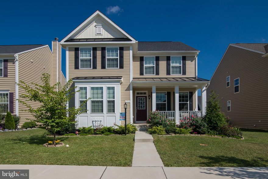 Meticulously kept & move in ready! 4 bedrooms, 2 1/2 bath, 2 car garage home features open flow floor plan with beautiful hardwood floors throughout the main level! Large gourmet with bright and sunny breakfast room which leads out to the deck and yard! Spacious master suite and luxury bath! Full finished basement / recreation room!  Shows like a model! Call & come see this home! See Virtual Tour!