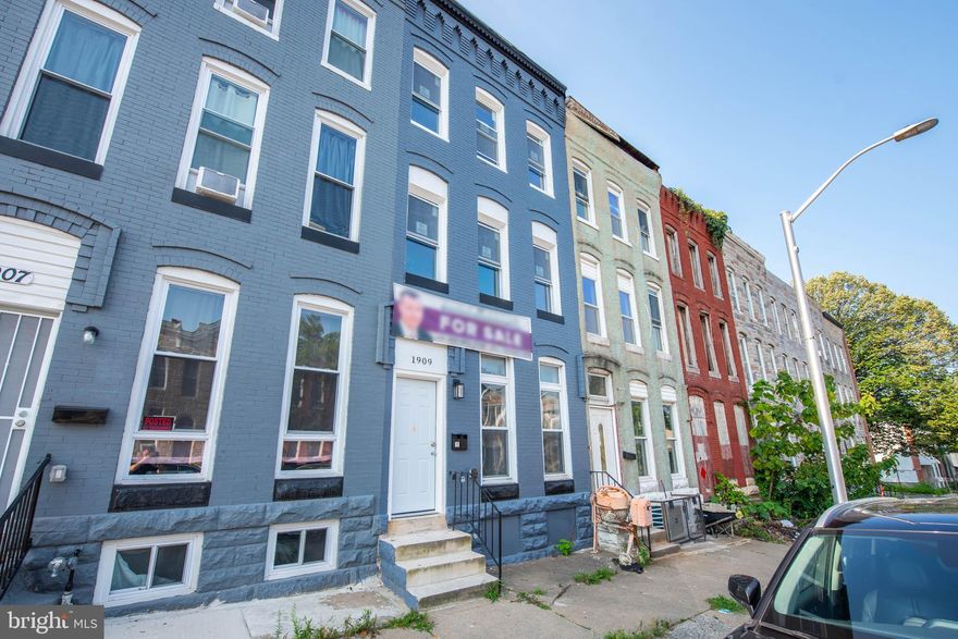 This 2 unit townhouse was recently renovated. On the first floor, there is a 1 bed 1 bathroom unit with a basement with its own electric box and furnace. On the second and third floor, there is a 3 bedroom 1 bathroom unit. On the second floor there is 1 bedroom, 1 bathroom, a kitchen, and a bathroom, on the third floor, there are 2 bedrooms, one of which has a back porch with its own entrance from outside. The second unit also has its own electric box and furnace. There is new plumbing system in the house as well as new gas line. It is a great opportunity for large families who wish to live in the same building, or for investors who wants live in one unit and rent out the other unit as a whole, or as individual rooms and pay the mortgage this way. There are many houses that are renovated in the street and there are others currently being renovated. The location of the house is also very convenient being close to downtown Baltimore. This multi-unit house is a must see!