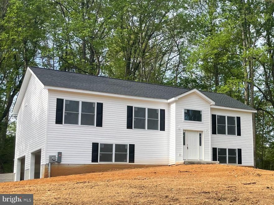 TO BE COMPLETED END OF JUNE/MID JULY 2023
4 Bed, 3 Full Bath Home on 1.5 acres! Grand Open Foyer, Open Floor Plan, and LVP throughout main living areas.  Main Level offers a beautiful kitchen with White Cabinets, Granite Countertops, SS appliances, and an Island - plenty of room to cook and entertain, Dining Space, Family Room, Primary Bedroom w/ 2 closets and ceiling fan, Primary Bathroom w/ double sinks, and walk-in shower. 2 Guest Rooms, and Full Bath. Walk out Level with 4th Bedroom, 3th Full Bath, and Laundry Room. Oversized 2 Car Garage and large driveway offers ample amount of parking. Peaceful and Private with nature views out every window. Welcome Home!

* All selections have been made
** Buyer to pay transfer stamps
*** Interior Pictures are Examples.