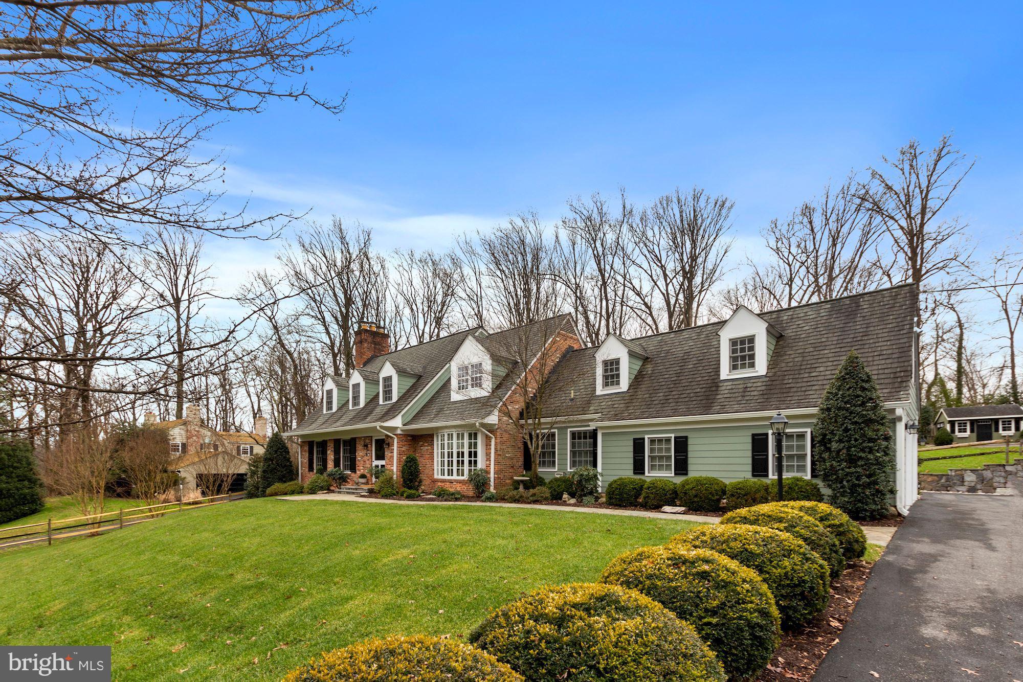 Inviting, completely expanded and renovated (2008 and 2014) into an extraordinary 5 BR 4.5 BA home with the charm of Williamsburg combined with today's exclusive home amenities. Sited on a one acre lot, screened from the street with extensive landscaping and hardscape, this house welcomes you with a charming living room, complete with a hearth , gracious dining room for large dinner parties, table space kitchen and adjoining family room, new office/den and a screened in porch on the first level. Upstairs be prepared to be amazed at the comfortable 4 BR 3 BA bedrooms, with closets galore, and neat nooks and crannies for extra charm and hiding places for kids. And not to be overlooked, the lower level adds additional living space with a large family room and working wood burning fireplace, spare bedroom or exercise room, , separate laundry room, full bathroom, and three bonus rooms for a future gym, play room, in law or au pair suite with a separate entrance . Plenty of room for studying, exercising, and working from home , with multiple options for generational living space. Outside space can accommodate a pool or tennis court, or simply enjoy the play house/garden shed in the yard. Great for entertaining outdoors--just add a heat lamp in the winter and enjoy dining on the flagstone patios. Completely painted, new carpeting, refinished hardwood floors, custom window treatments, alarm system, chair railing and moldings, tray ceiling, 2 fireplaces, French doors, bay windows, attached oversized two car garage and tons of parking on the paved driveway---just missing YOUR FAMILY to transform this house into your home sweet home.