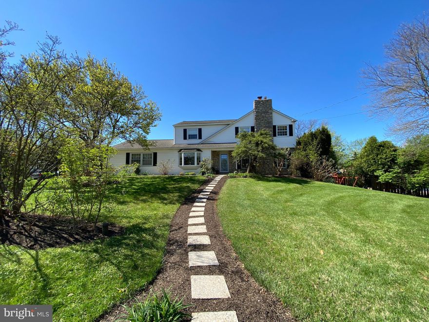 Meticulously maintained 4 bedroom colonial situated on a picturesque corner lot features mature landscaping, hardscaping, sidewalks and partially fenced in rear yard.  The maintenance fee exterior features siding with stunning stone accents and a two car side entry garage.  The home features a spacious country kitchen with oak cabinetry, center island with seating, stainless steel appliances, tile flooring and recessed lighting.  The formal dining room features access to a very large rear partially covered concrete patio perfect for entertaining or just relaxing and enjoying nature.  The living room features a stone wood burning fireplace with plenty of natural light.  The family room features a large bay window overlooking the mature landscaping.  Original hardwood flooring as well as some tile flooring, a powder room and laundry complete the main level.  The second level features a large primary bedroom with a walk in closet, additional closet and a primary bath, three additional bedrooms and a hall bath.   A spacious basement with walkout exit.  This property is an entertainer's dream, featuring excellent flow from room to room.  The layout provides a perfect space for large gatherings, family events, and special occasions. A must see meticulously maintained home.