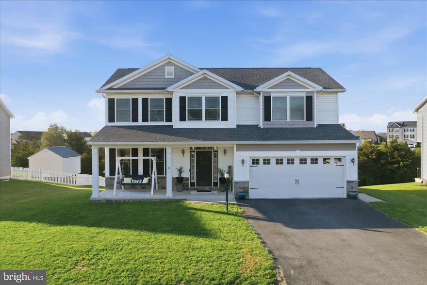 Welcome home to this beautifully maintained colonial in Greencastle! Built in 2017, this spacious 4-bedroom, 2.5-bath residence offers the perfect blend of modern comfort and timeless style.  Step inside to find a warm and inviting interior featuring neutral tones throughout—ready to complement any décor. The main living area is anchored by a cozy propane gas fireplace, creating the perfect space to relax or entertain. The thoughtfully designed layout flows seamlessly into the dining, living and kitchen areas.  The kitchen boasts granite countertops, stainless appliances, and a huge center island.  Upstairs, you’ll find four generously sized bedrooms, including a serene primary suite complete with a private en-suite bathroom, walk-in closet, and cathedral ceiling.  This level also offers another full bathroom and laundry room for added ease and functionality.  The home also features a walk-out basement, partially finished to provide additional living or recreational space, along with dedicated storage areas for all your needs. Outside, enjoy the sunrises or sunsets on the deck and concrete patio overlooking the backyard.  An attached two-car garage adds both convenience and practicality to this already impressive home.  Don’t miss your opportunity to own this move-in-ready gem in a desirable location—schedule your showing today!