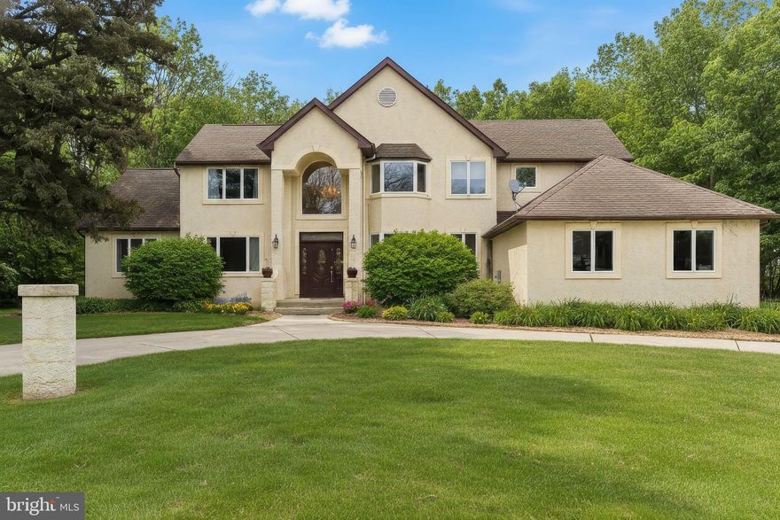 Welcome to 20 Edelweiss Court, a stunning French-inspired, custom built center hall Colonial tucked away on a private cul-de-sac in one of Voorhees’ most desirable locations. Offering over 4,200 sq ft above grade plus approximately 1,200 sq ft of fully finished basement space, this home delivers exceptional value for its size, layout, and setting. Situated on 0.81 acres of perfectly level, fully fenced property, the backyard offers endless possibilities — room for a pool, sports court, and outdoor oasis of your dreams.

The impressive two-story foyer with a grand staircase and gorgeous chandelier opens to a dramatic two-story family room with a wood-burning fireplace, oversized windows, and a secondary staircase. The spacious eat-in gourmet kitchen features a center island, granite countertops, stainless steel appliances, island cooktop with exterior downdraft ventilation, and abundant cabinet and counter space. The main level also includes a formal dining room with soaring ceilings, formal living room, private office, and a spectacular two-story conservatory filled with natural light and its own exterior entrance. A first-floor bedroom with full bath provides ideal flexibility for guests or multigenerational living, along with a mudroom and oversized three-car garage.

Upstairs, you will find four generously sized bedrooms and two full bathrooms. The primary suite offers a large en-suite bath with double vanity, Jacuzzi tub set beneath a bay window, separate shower, and walk-in closet. The finished basement adds substantial living space, including a recreation area, separate laundry room, storage space, and direct access to the garage.

With a wide driveway that accommodates eight or more vehicles plus a circular drive, excellent schools, close proximity to shopping and dining, and only 25 minutes to Philadelphia, this home offers luxury, space, and location at an incredible price point! Opportunities like this are rare — don't wait!