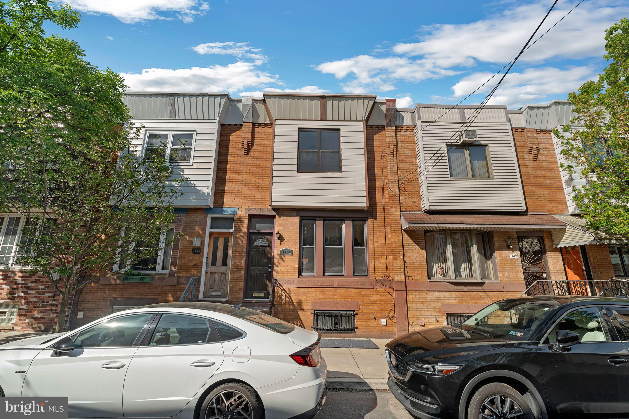 Three bedroom, one and a half bath townhouse less than one block from the Singing Fountain in Passyunk Square. Enter through a vestibule to find original, restored wood floors with mahogany inlay. Convenient half bathroom on the first floor. Large kitchen with tile backsplash and stainless steel appliances, including a dishwasher. Plenty of windows provide abundant natural light. Spacious private back patio. The second level has three bedrooms, each with closet space. Brand new ductless mini-splits for air conditioning! Full basement, with washer and dryer and ample storage space. Located just steps from Passyunk Avenue, Columbus Square Park, ACME grocer, Pat's & Geno's, and many more notable shops and restaurants. Tenant is responsible for utilities.