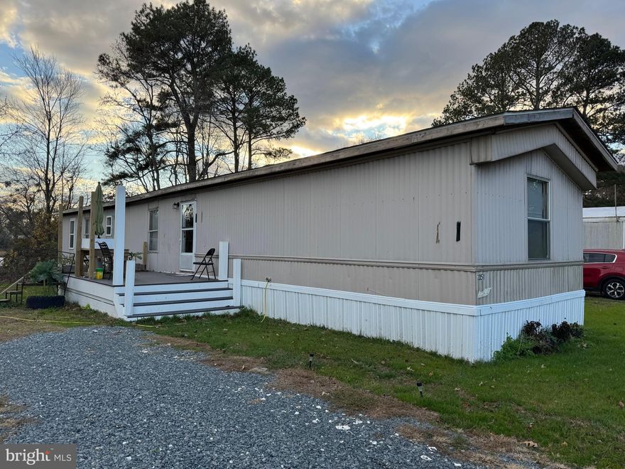 Beautifully maintained 3BR/2BA manufactured home featuring an open floor plan with abundant natural light. Kitchen offers granite countertops, built-in microwave, and stove. Primary bedroom includes an updated en-suite bath. Two additional bedrooms and full hall bath provide flexible use. Monthly lot rent is $490 - does not include water- plus $18 for trash pickup.