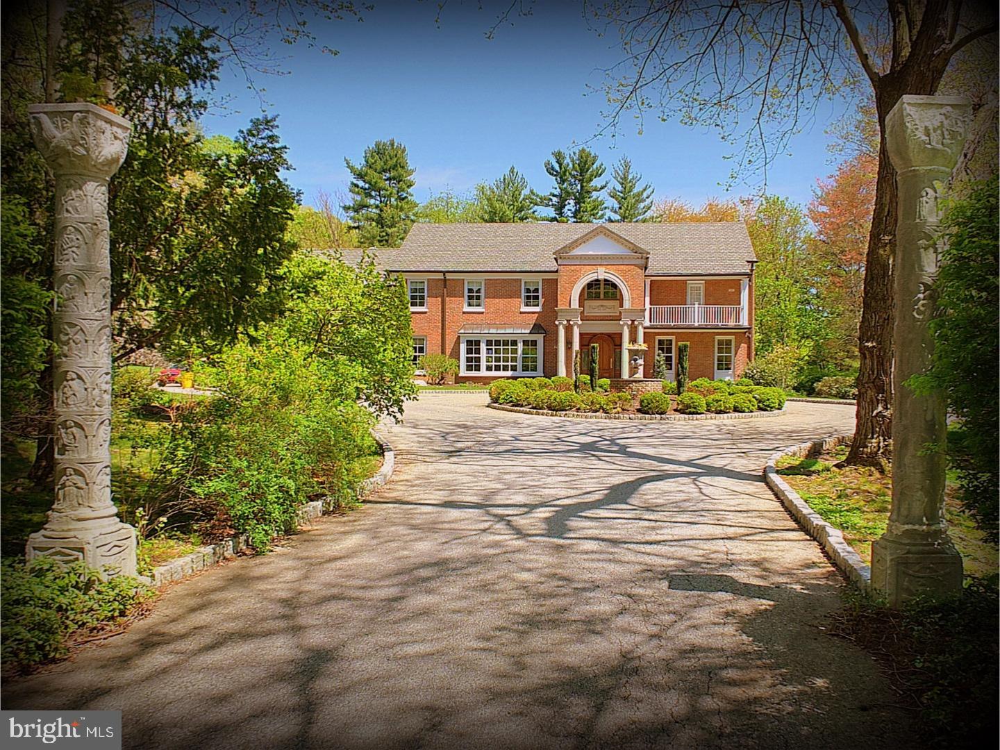 You will feel the quality the minute you pull down the long driveway & up to the double front doors of this gracious elegant home, situated on almost 1 3/4 +/- magnificently landscaped acres & on one of the most desired neighborhood streets in Gladwyne. Vestibule entrance with 2 wall fountains lead to the spacious marble foyer with French doors opening to the banquet size formal dining room with large picture window, window seat & hardwood flrs & to the formal living rm with large windows on 2 walls with beautiful views of the lush landscape & a fireplace. The paneled study with doors from the living room & double doors from the center hall opens to the rear patio & offers a wall of built-in cabinetry & fireplace. The center hall offers a guest powder room, 2 double coat closets & entry to the lower level. The spacious kitchen offers an island, top-of-the-line appliances, abundant cabinetry, desk area & a breakfast area with door to rear patio. The kitchen is open to the incredible Great room addition with soaring beamed ceiling, large wet bar, carved fireplace mantle, walls of built-in cabinetry, beautiful random width hardwood flrs, doors to the patio & a full bath. The convenient laundry room with laundry shoot from the 2nd floor, rear staircase to the 2nd floor, rear stair to the lower level & entrance to the garage complete the main level. A gracious staircase in the foyer, leads to the 2nd floor landing & the master suite, consisting of a large, bright bedroom, his & her outfitted, walk-in closets, office/dressing area, enlarged bathroom with whirlpool tub, stall shower & double vanities. Bedroom 2 with bath, bedroom 3 has 2 closets & a bath with tub/shower. Bedroom 4 offers a separate office & shares a hall bath with bedroom 5. A large linen closet & rear staircase completes the 2nd floor. The walk-out lower level, entered from the center hall, offers playroom, exercise room, utilities & storage, cedar closet, office, room currently used for nanny, full bath & rear staircase to kitchen. A long driveway bordered by beautiful plantings & columns lead to a large circular driveway & overlook lushly planted grounds, flagstone terrace overlooks the heated pool. Large shed for storage, whole house generator. Large paved parking area, wonderful cul-de-sac neighborhood, sought after Lower Merion Schools...plus total privacy?yet minutes to all major roadways, the village of Gladwyne, King of Prussia, Center City & Philadelphia International Airport!