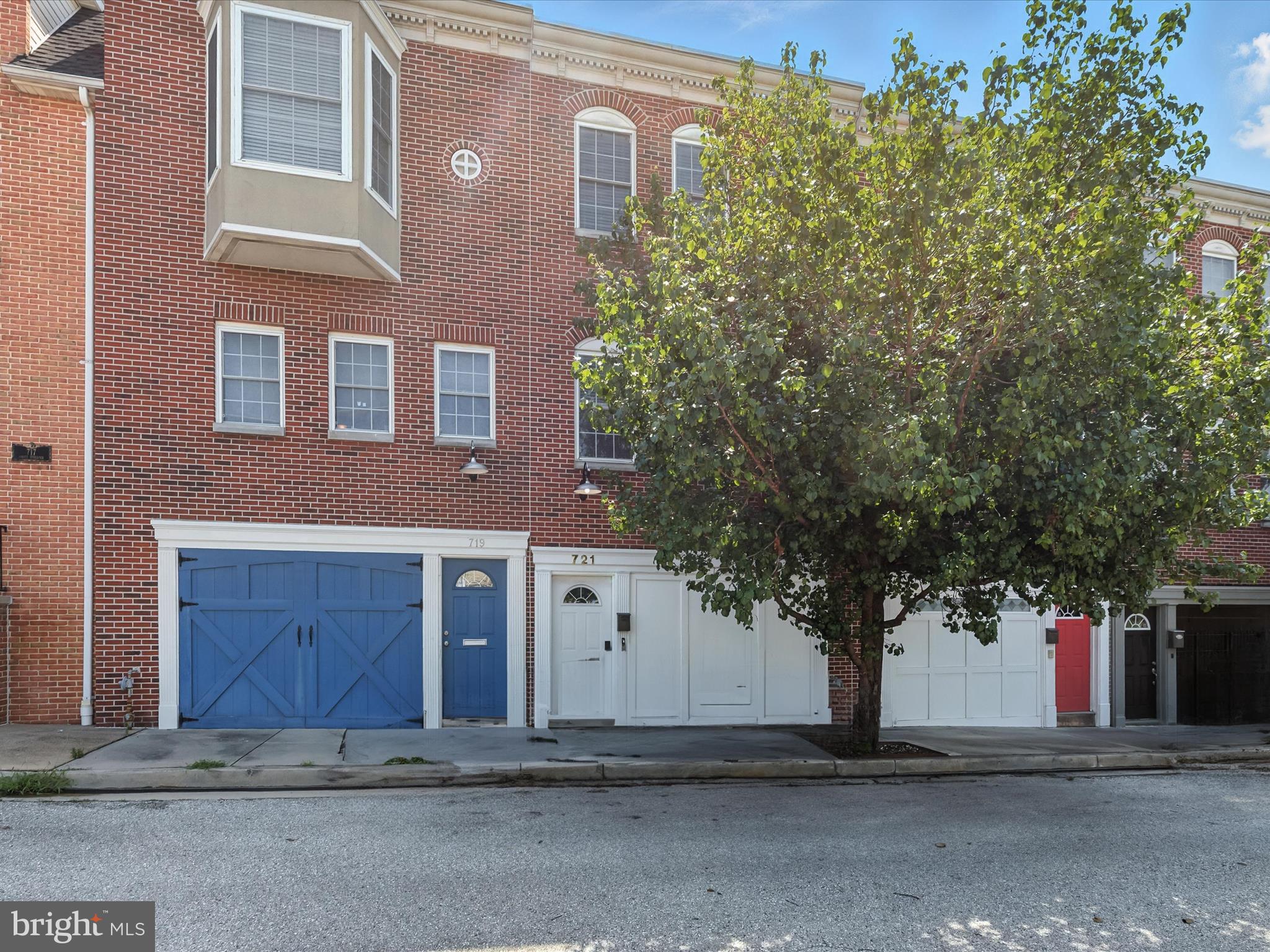 Discover this exceptional brick townhome in the heart of Canton, offering nearly 2,000 sq. ft. of beautifully designed living space and the rare convenience of two-car parking. Built in 2003, this home showcases a wide, open layout that blends style and functionality in one of Baltimore’s most vibrant neighborhoods. The main level welcomes you with soaring ceilings, abundant natural light, and rich hardwood floors that lead through spacious living and dining areas. A chef’s kitchen anchors the space with granite countertops, stainless steel appliances, an oversized island, and 42” cabinetry with thoughtful touches like a built-in spice rack, perfect for cooking and entertaining alike. Upstairs, you'll find two generous bedrooms, including a tranquil primary suite complete with dual closets, plush carpeting, and a spa-like bath with a jetted tub and walk-in shower. The second suite enjoys private access to a sprawling Trex rooftop deck, offering breathtaking city views, ideal for hosting guests or unwinding under the stars. The entry-level adds flexibility with a separate living area or bedroom and full bath, perfect for guests, a home office, or workout space, along with a welcoming mudroom entrance. Ideally located just steps from Canton’s best restaurants, waterfront parks, and local shops, with quick access to major commuter routes I-95, I-83, I-695, and downtown attractions. This is city living at its finest. Schedule your showing today!