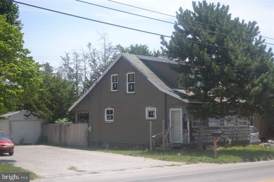 Being sold AS-IS. This ppty is perfect for the rehabber. It was in the process of being restored when the owner had to leave. It has been re-drywalled- the hardwood floors have been sanded all new replacement windows have been installed, and most of the demolition has been done. Home comes with most of the materials needed to restore it. The sale includes New metal roof, new siding, kitchen cabinets etc. all it needs is someone to install them.