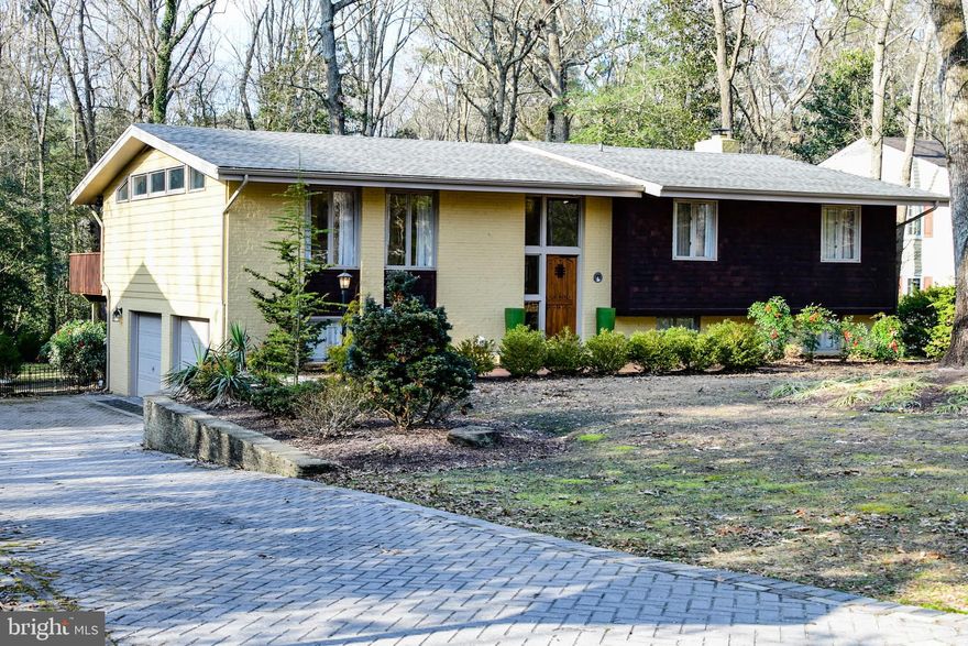 Stunning 2 level split foyer with 1722 SF up and 1040 SF down. 3 bedrooms, office (could be bedroom #4), 2 full baths, Kitchen, Living and Dining room upstairs and huge family/rec room with fireplace, full bath (#3 total) and wet bar downstairs. Huge 2 car garage. Bamboo and ceramic tile flooring, granite counters. Extensive Hardscaping with herringbone paver drive. All in desirable Tony Tank neighborhood! Come take a look!