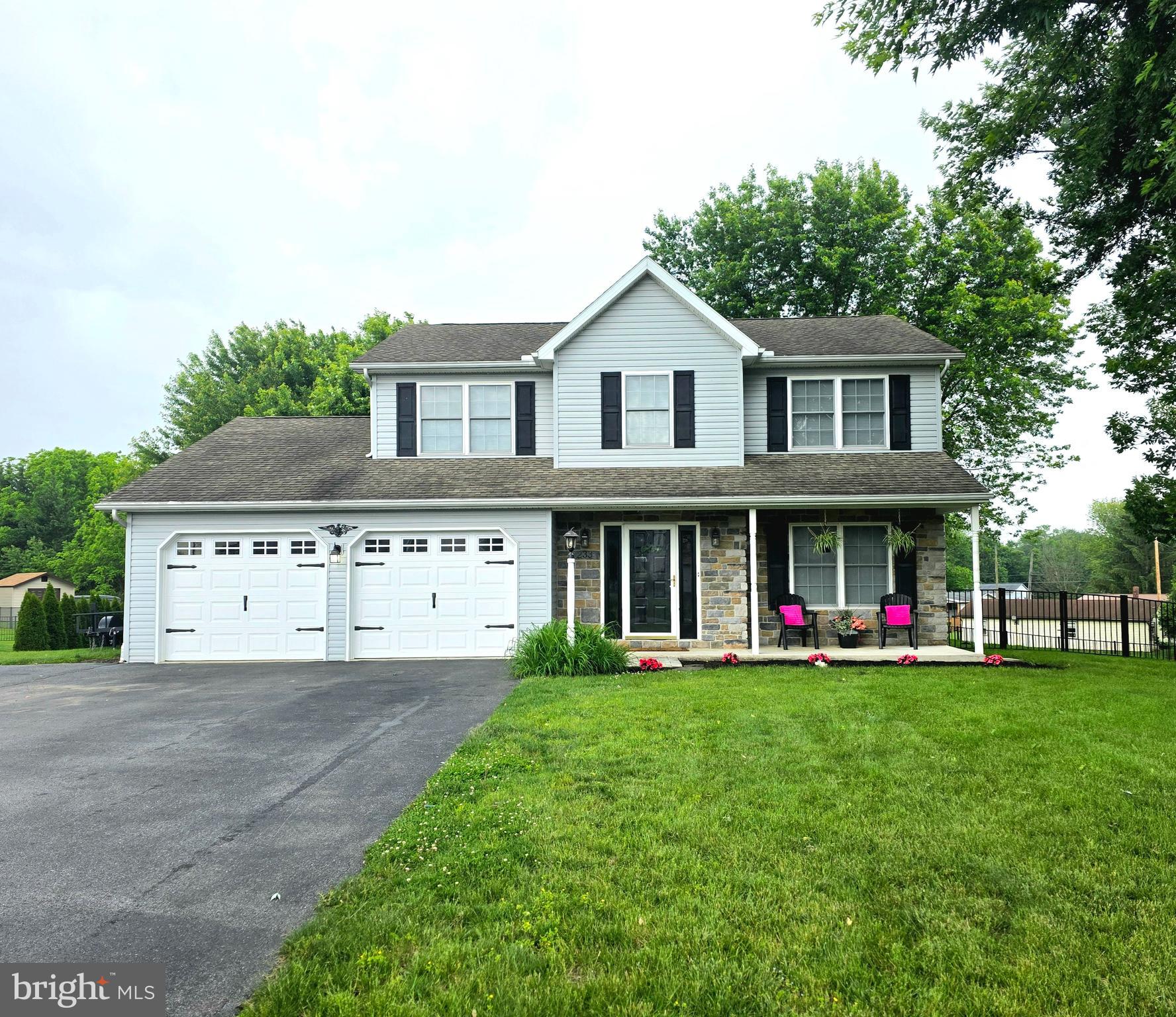 PRICE ADJUSTMENT: We’ve updated the price to better align with market feedback, making this beautiful home even more attainable and affordable. This is your chance to own a spacious, updated home in a sought-after neighborhood!
233 Stony Point Ave, Shippensburg, PA 17257
4 Bed | 2.5 Bath | Estimated 2,718 Total Sq Ft Including Finished Basement | Breathtaking Sunroom | Heated Garage | No HOA
This is the one you’ve been waiting for — a beautifully updated 4-bedroom, 2.5-bath home tucked into a peaceful pocket of Shippensburg, where homes like this rarely hit the market. With no HOA, a stunning sunroom, and a flexible layout, this home offers more space and value than tax records reflect. Step into a grand, light-filled foyer that welcomes you with warmth and style. The main level flows effortlessly, blending thoughtful updates with cozy, functional spaces.
Lower level has been newly finished with drywall, updated flooring, and flexible rec/living space. Approximately 872 sq ft of additional space not included in the recorded square footage. The basement includes a spacious rec room (pool table included), a bonus room ideal for a guest room or office, and a separate lounge or game area. The sunroom, wrapped in windows, offers a peaceful retreat for morning coffee or quiet evenings. The updated kitchen features stylish two-tone cabinetry and modern finishes. A heated garage provides year-round comfort, and the fenced backyard with a deck and koi pond creates a private oasis for relaxing or entertaining. Ample off-street parking adds convenience, and the location is in a quiet, sought-after neighborhood near schools, parks, and commuter routes.