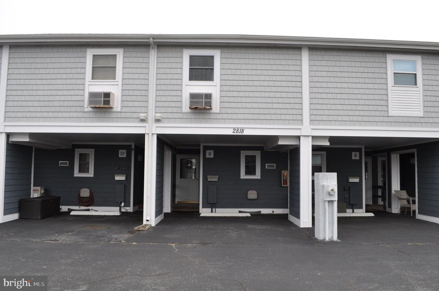 A little piece of heaven awaits you. Welcome to Old Port Cove West Community where location is everything. Visit this waterfront "Beach Retreat" which may be one of the Best-Kept Condo Complexes In Ocean City. This complex offers a wide canal close to the bay for convenient boating, New Wolf pvc Decking, Hardiplank Siding, Vinyl Railings and privacy side walls with a storage closet. A New Roof installed May 2022.  Also steps away from our salt water community pool. Within walking distance to area attractions including the world famous Ocean city Boardwalk, beach, amusement parks, restaurants and night life, mini golf and more!! This is a turn key condo that comes equipped with furnishings and appliances. Living Room looks out onto the canal and has a wood burning fireplace for those chilly evenings. Eat in kitchen with breakfast bar.  Large primary bedroom with vaulted ceiling and full bath, 2 closets and laundry on second level. This unit owner is the second owner from new build and never rented. Hot water heated 2018.