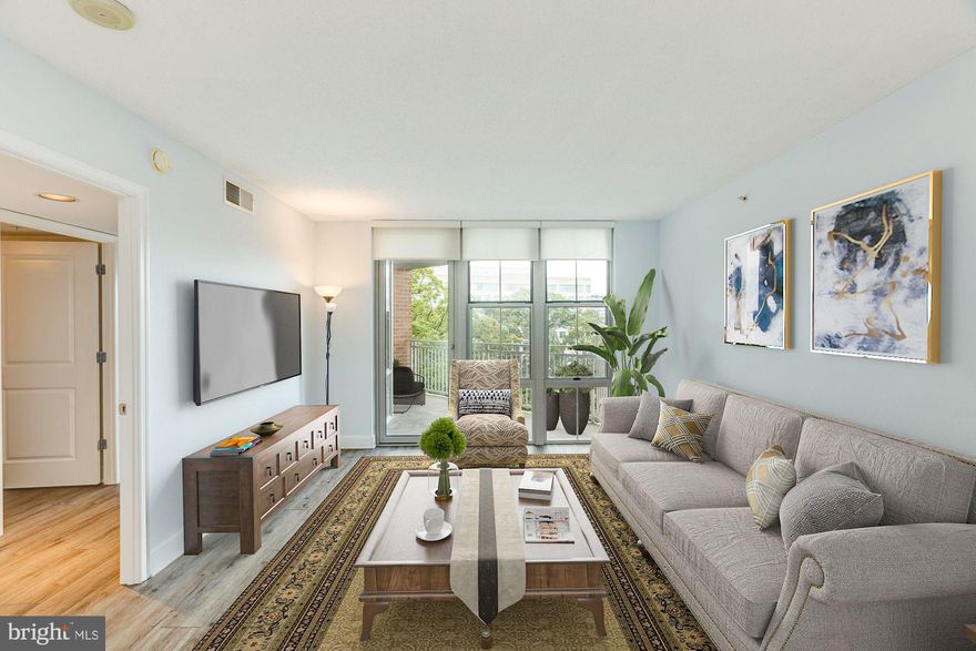 Location, Location, Location! Make your next home here at The Carlton House, a high-rise condominium located in Reston Town Center at the intersection of Sunset Hills Road and the Reston Parkway. Move right into this absolutely gorgeous turn-key 2 bed/2 bath home with OVER 20K OF RECENT UPDATES! You will love this open floor plan that features brand new kitchen stainless steel appliances (2020), modern granite countertops throughout (2005), new Delta Touch kitchen sink faucet (2020), new garbage disposal (2020), new GE washer/dryer (2018) and new engineered hardwood flooring (2020) throughout including bedrooms and closets. This home has just been freshly painted from top to bottom including all doors and trim. Enjoy all of the natural light from the floor to ceiling West-facing windows in the main living room and bedrooms with new electronic roller window shades (2019). These window shades can be paired with Alexa and comes with two remote controls. Enjoy morning coffee or your favorite evening cocktail on the spacious deck that offers panoramic views of the Reston Town Center. Parking is a breeze with 2 full size side-by-side underground reserved garage spaces (G-1, #435, #436) with no neighboring vehicles and just steps from the entrance to the garage elevator. Once off the elevator, the unit door is just a few steps away. Enjoy the luxury condo amenities that include a secure entry and front desk concierge. Residents can also enjoy a rooftop pool, media/theatre room, business center, party room, BBQ grills, billiards room, and fitness center.  Located a short walk away from the incoming Reston Town Center Metro stop and the Washington and Old Dominion Trail, your home is also minutes to the Dulles Toll Road, Route 7, Fairfax County Parkway, Tysons Corner, Reston Hospital Center, Wolf Trap National Park for the Performing Arts and the Wiehle Metro stop. All this accessibility and more for this wonderful, spacious home!