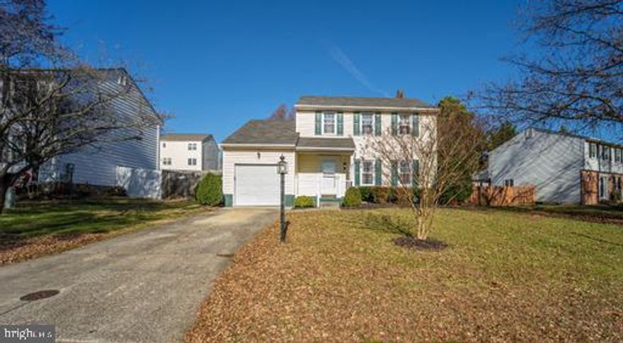 An exquisite Diamond in the hearthstone of Linthicum Oaks.  This gem is located on a private cul-de-sac allowing for limited traffic.  Beautiful move-in ready three (3) bedroom Colonial situated.  The front entrance area is tiled. The rest of the house is wall-to-wall carpeted.  A convenient coat closet is within arm's reach of the front door.  There is an extremely spacious living room/dining room open concept with a plethora of natural light throughout.  The kitchen is located just off the dining room with plenty of room to add a center island.  In addition, the family room is an open space from the kitchen.  This home has a consistent flow from room to room. The updated gas fireplace accentuates the family room with a glow of love.  The sliding glass door is spaced between the living room and kitchen and exits to a relaxing, private enclosed porch. Enjoy the peaceful night hosting friends. There is a half bath on the first floor.  The second floor has three (3) bedrooms and two (2) full baths.  The primary bedroom has a full bath located within. Attic access is available from the second floor.  Room to run in the fenced backyard.  What an area to enjoy sharing special times with friends and family.  The laundry room is located on the first floor.  The garage is attached to the house and has a private entrance for security.  Don't miss the Open House today from 11am-2pm.