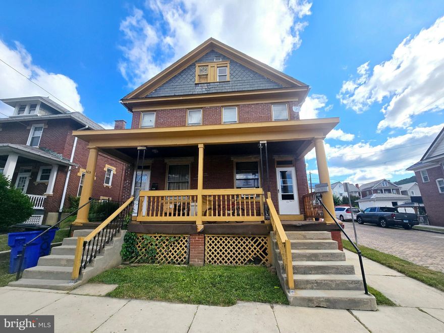 Great income producing duplex!. Both units feature plenty of space with a living room, dining room and kitchen on the main level and 3 bedrooms and a full bath upstairs. 601 also has a half bath on the main level. Both sides have access to walk-up attic space that could be finished into more living area!