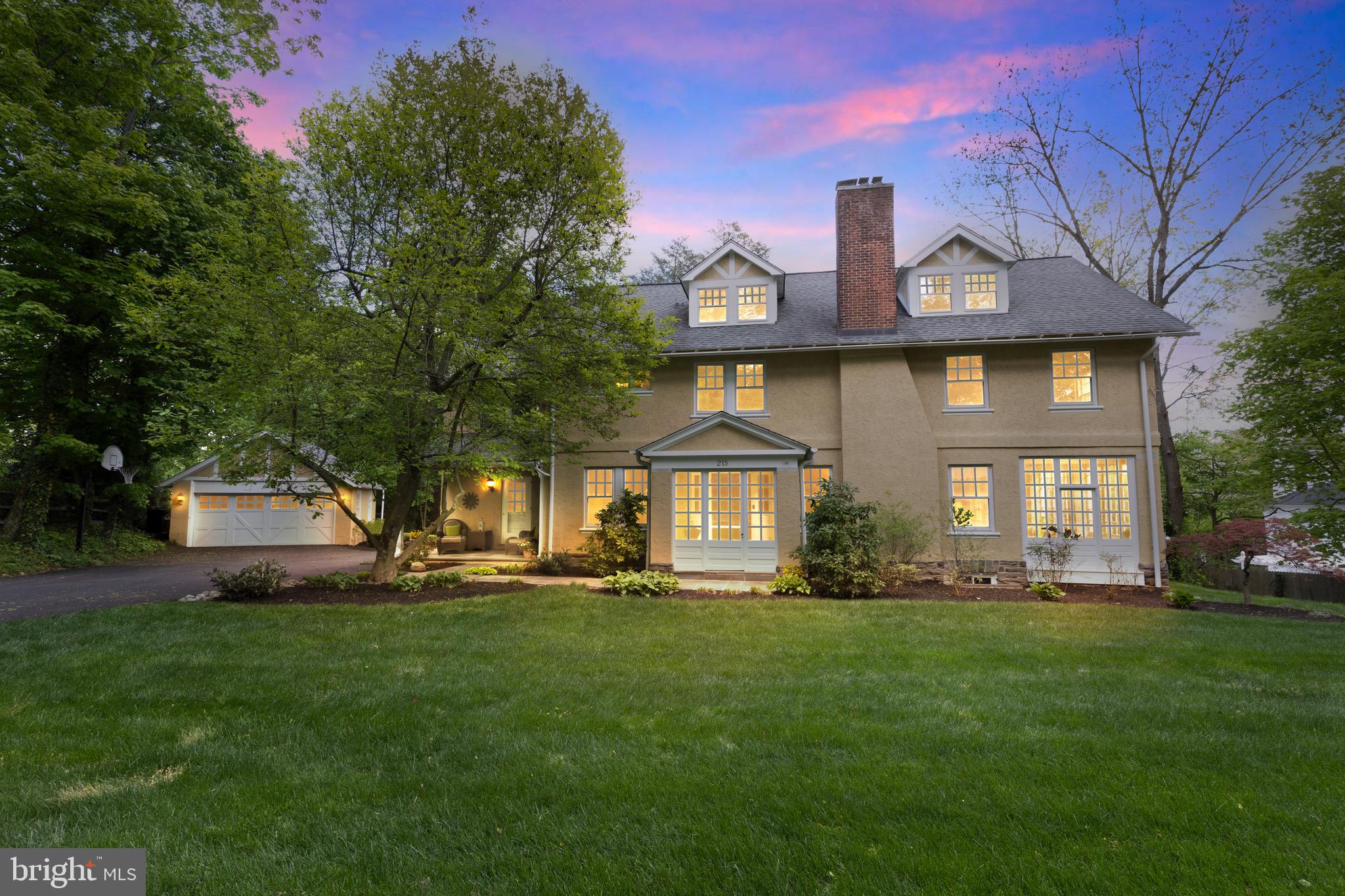 Welcome to 215 South Aberdeen Avenue, a stunning 7 bedroom, 3 full bath, 2 half bath home located in the beautiful and highly desired historic South Wayne neighborhood! As you enter the home, you'll be greeted by beautiful hardwood floors that flow throughout the main floor and expansive natural light throughout the entire house. The living room is spacious and perfect for entertaining guests, while the formal dining room is perfect for hosting elegant dinners. The year round sunroom offers an abundance of natural light and is perfect for relaxing and enjoying the beautiful views of the outdoors. The kitchen is a chef's dream, complete with stainless steel appliances, a kitchen island, plenty of countertop and cabinet space, bar stool seating and a breakfast area. A dual sided fireplace separates the kitchen from the sitting area, creating a cozy and inviting atmosphere in both rooms. A half bath and “cubbie” filled mudroom complete the main floor. Upstairs on the second floor, you'll find 5 bedrooms and 2 bathrooms. The primary suite is separated with a hallway door and includes 2 bedrooms with an interior door to a third bedroom (nursery). Great for office space. The primary bedroom is spacious and boasts a beautiful woodburning fireplace. Primary bathroom is recently renovated and includes a standing glass shower and custom closet. The rest of the second floor includes 2 bedrooms, a full bathroom and a convenient laundry room. The third floor offers 2 additional bedrooms and one full bathroom, perfect for accommodating guests or creating a home office space. The fully finished walkout basement is perfect for relaxing or entertaining, with a half bath and easy access to the beautiful back patio and hot tub. The back terrace is perfect for outdoor entertaining, and the back of the property backs up to beautiful trees for added privacy. There is also an expansive front yard and a separate two-car garage for your convenience. Walk to Wayne location for restaurants, shops and either the Wayne or St. Davids train stations. Located in Radnor School District. The property is also located near several parks and recreational areas, including the beautiful Valley Forge National Historical Park, perfect for outdoor activities such as hiking and biking. With its prime location and beautiful features, 215 South Aberdeen Avenue is the perfect place to call home.