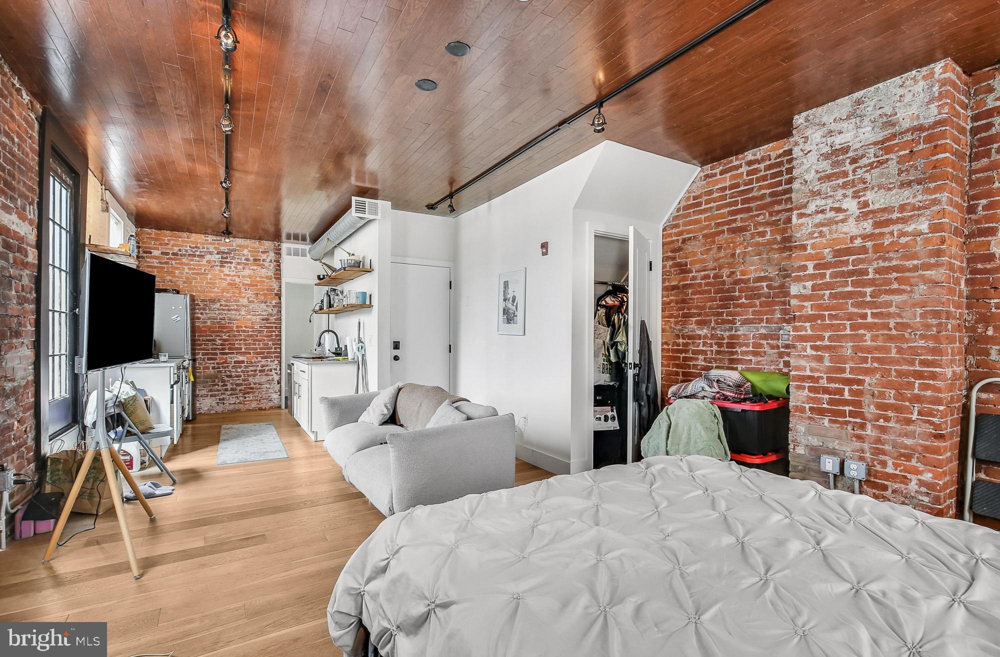 Available Early September:
Welcome to the 19 Hundred! Presenting a modern-industrial Studio, 1 bathroom apartment located on the second floor and boasts exposed brick and ductwork, reclaimed wood surfaces, upscale fixtures, and vibrant hardware. Enter into the spacious open floor plan, flooded with natural light and accented by exposed brick walls. The space flows seamlessly and efficiently into the dining nook overlooking Center City by way of a stylized Juliet balcony. Your galley kitchen is gorgeous, complete with stainless steel appliances, metallic accents, floating shelves, and polished finishes. This area is illuminated by both track lighting and a brass statement piece. Continue to the full bathroom, offering pops of color and fun with its stunning blue tiling, globe-inspired vanity set, and spacious glass-enclosed shower. Venture downstairs to the common laundry in-building and explore the city's storied history throughout its hottest neighborhoods. Call us today!
Lease Terms:
Generally, 1st month, 12th month, and 1 month security deposit due at, or prior to, lease signing. Other terms may be required by Landlord. $55 application fee per applicant. Pets are conditional on owner's approval and may require an additional fee, if accepted. (Generally, $500/dog and $250/cat). Tenants responsible for: electricity, $50/month WiFi/internet fee, and a $50/month flat water fee. Landlord Requirements: Applicants to make 3x the monthly rent in verifiable net income, credit history to be considered (i.e. no active collections), no evictions within the past 4 years, and must have a verifiable rental history with on-time rental payments. Exceptions to this criteria may exist under the law and will be considered.