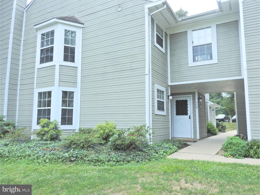 Bradford Square Townhome, 2 bedrooms, 1 full bath, 2nd floor flat, open floor plan, kitchen with newer counters, tile backsplash, open to dining room with hardwood floors, opens to spacious living room with custom fireplace and sliders to private deck.  Master bedroom with double door closets, ceiling fan, entrance to large full bath, custom tile floor & walls.  2nd bedroom with large closet.  Laundry room in hallway.  Pantry off kitchen.  Pull down attic storage.  No smoking permitted.  Available Immediately!