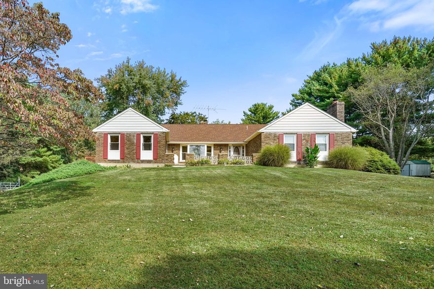 This spacious rancher offers over 2,500 sq. ft. on the main level plus a partially finished lower level, providing abundant space to live, entertain, and relax. A second kitchen is ideal for canning, baking, or preparing for large gatherings, while the rear porch is perfect for unwinding and overlooking the pasture. Start your mornings on the deck off the kitchen, enjoying peaceful views.
The side-entry 2-car garage adds convenience, and the property’s thoughtful layout blends comfort with functionality. Inside, you’ll find 3 generously sized bedrooms and 2.5 baths, along with multiple living areas. The main level features a cozy pellet stove, while the lower level includes a wood stove—adding warmth and charm year-round. Key updates include a newer roof and heater, giving peace of mind for years to come. With ample storage throughout, everything has its place.
Set on 3.29 acres and no HOA , the property boasts plenty of open yard space for gardening , animals or simply enjoying the serene surroundings. 
All this, just 3 minutes from Fair Hill Natural Resources Management Area—home to world-class equestrian events including the prestigious Maryland 5 Star. The location also offers quick access to the Pennsylvania line and the University of Delaware.
This property is truly a rare find—combining space, updates, and an unbeatable location.