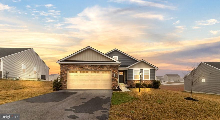 Welcome to your dream home in the desirable area of Spring Mills.  This charming 3 bedroom, separate office, 2 full bath rancher is just 2 years young. Nestled in the Cardinal Pointe development, this home offers the perfect blend of tranquility and convenience.  Inside, the thoughtful layout of this rancher ensures every inch of space is utilized efficiently. Say goodbye to stairs and hello to single-story living, where each room serves a purpose and flows seamlessly from one to the next. The basement has endless possibilities for customization and expansion to suit your unique needs and preferences. Imagine creating the ultimate entertainment space, home gym, or additional living area – the choice is yours with multiple electrical outlets and a bathroom rough-in already in place.   You'll enjoy added privacy and tranquility on this desirable plot with no direct rear neighbors. Step outside to your backyard oasis, complete with steps and a 4’ white vinyl fence, offering the ideal setting for outdoor gatherings or simply unwinding after a long day.  Convenience is key in this location, with easy access to I-81 and just a short drive to Hagerstown and Martinsburg for shopping, dining, and entertainment options. Plus, essentials like gas stations, fast food chains, and a Walmart are just moments away for added convenience.  Don't miss out on the opportunity to make this meticulously designed home yours. Schedule a showing today and experience the convenience, comfort, and tranquility that await you in this Spring Mills gem.  Seller to close with Cardinal Title.