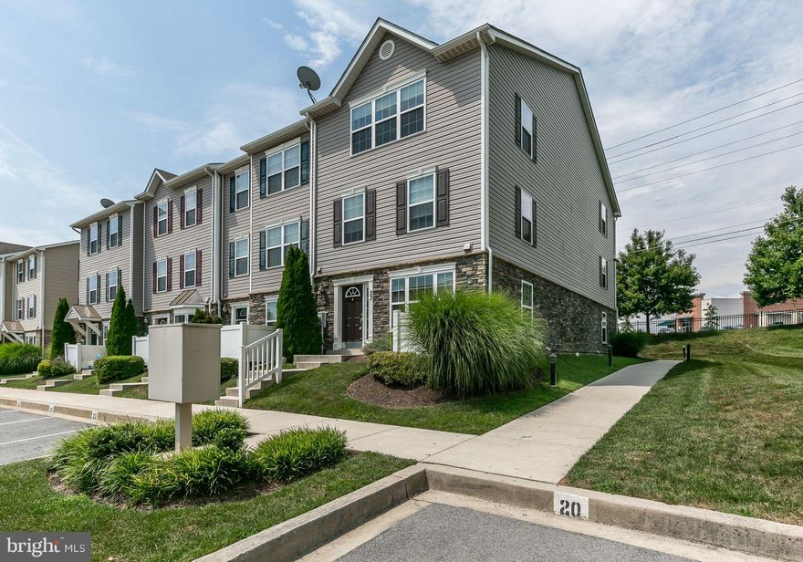 Rarely available, this end of group townhome/condo is in the highly sought-after community of Reservoir Ridge.  The first level offers trendy scraped rustic hardwood floors, a powder room, and an updated kitchen with built in cookbook shelves, stainless steel appliances, and plenty of cabinet and counter space.  The next level has convenient laundry, a full guest bathroom and two spacious bedrooms.  The owner's suite is the entire top level of the home offering an expansive bedroom space, enough for a siting area or office space, oversized closet, and private en suite bath.  There is a lovely community pool, playground, and picnic area.  The location is PERFECT, just right down the road from shopping, restaurants, and more.  Welcome home!***Photos are from right before the current tenant moved in.  This is tenant occupied and requires 24 hours notice to show***